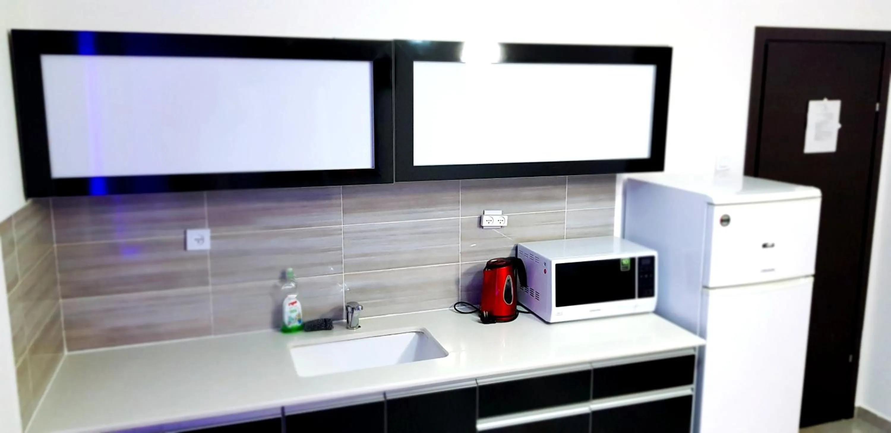Kitchen or kitchenette in City Apartments
