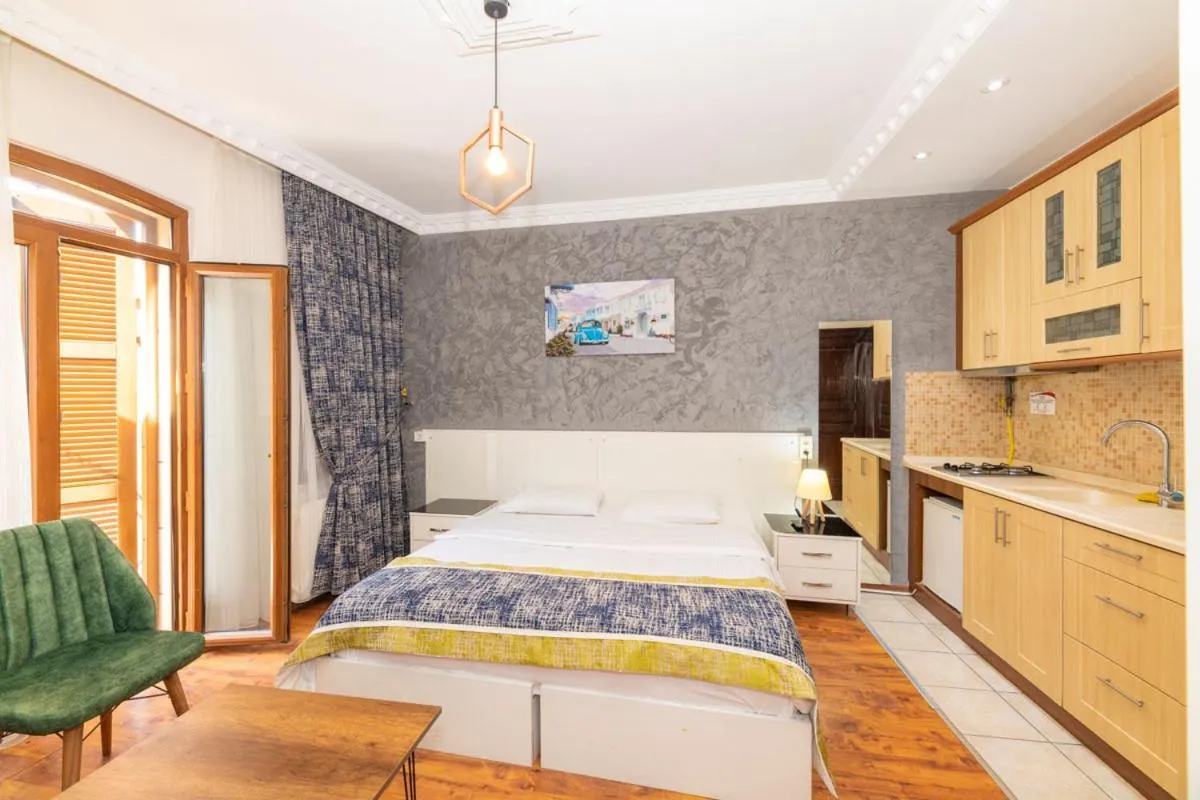 Bed in GRAND OPERA HOTEL