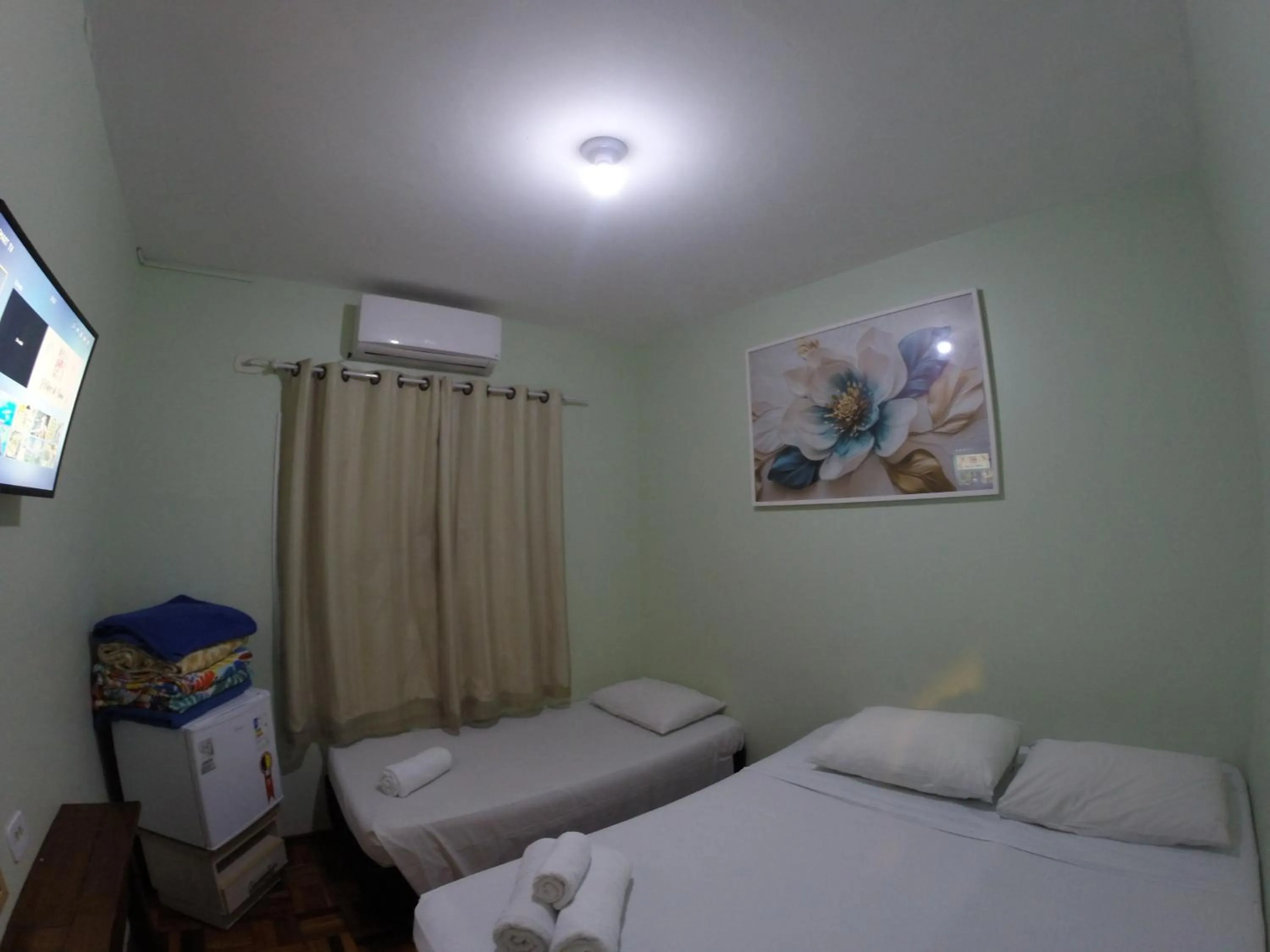 Bed in POUSADA EVELINA