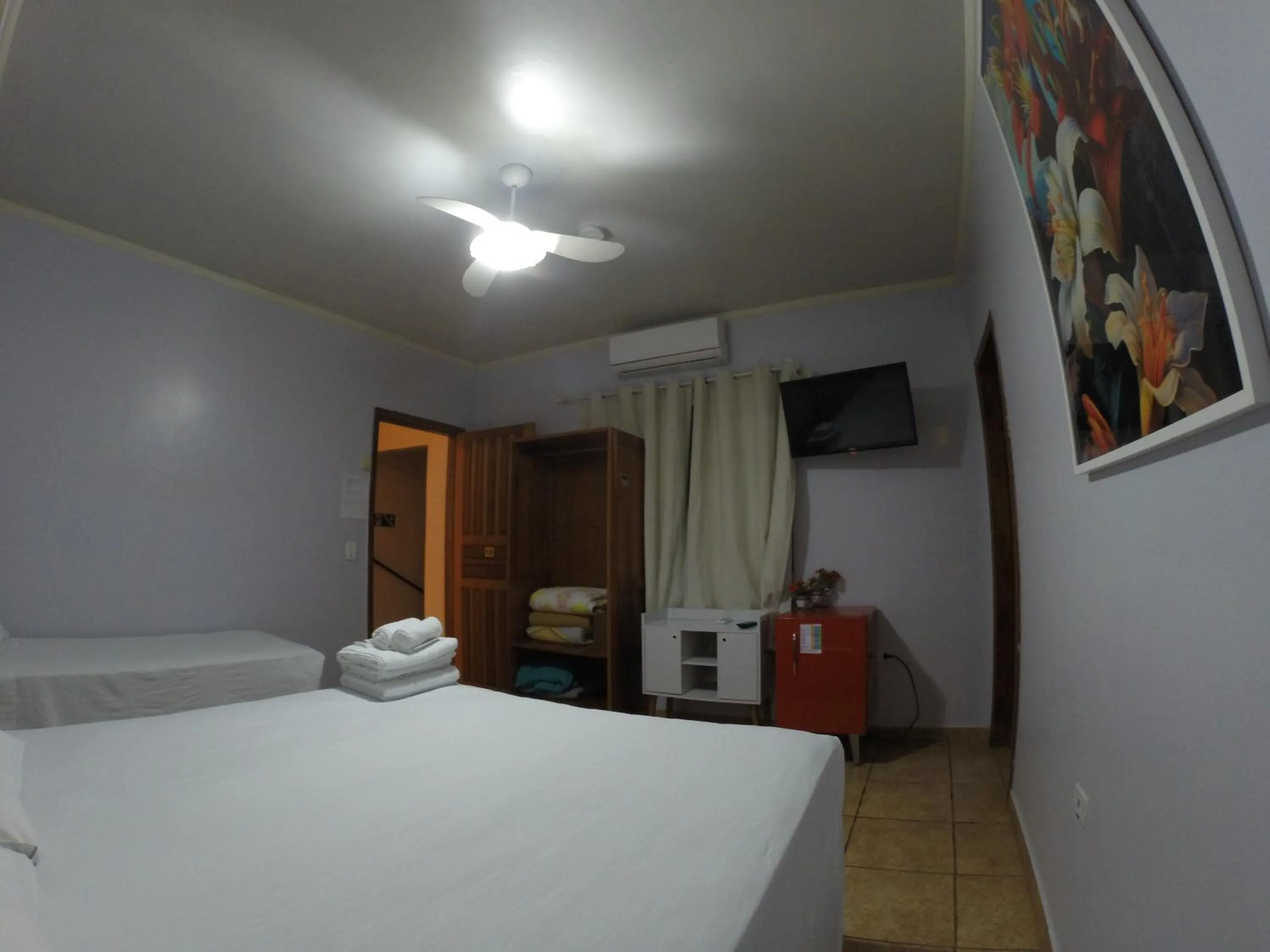 Bed in POUSADA EVELINA