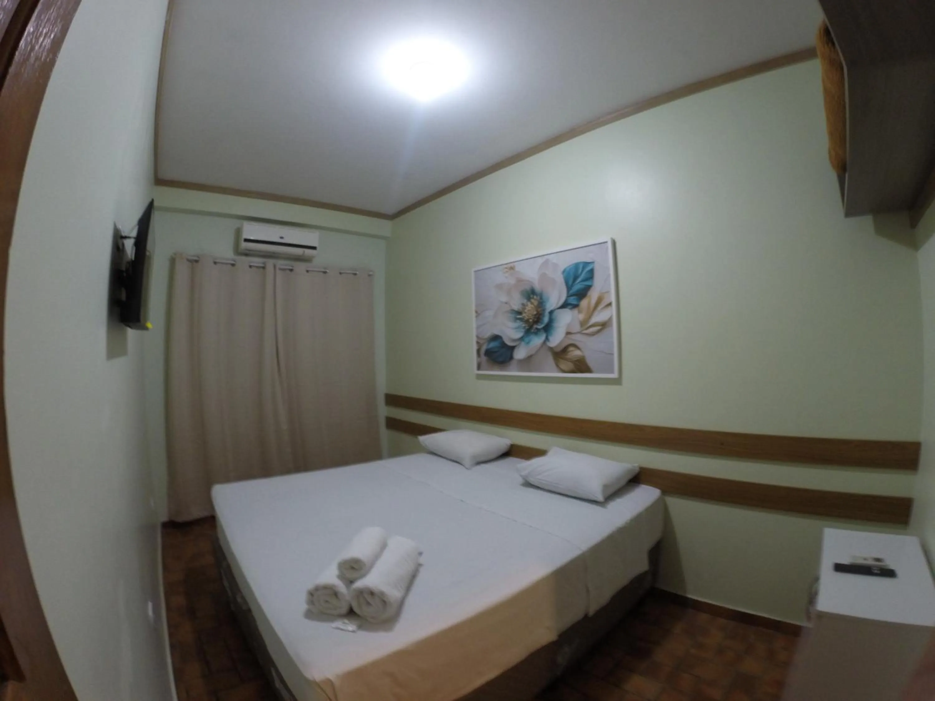 Bed in POUSADA EVELINA