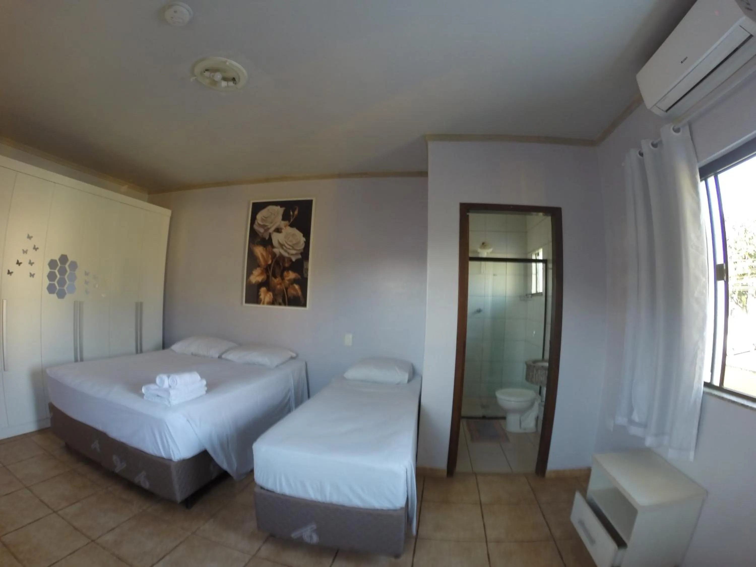 Bed in POUSADA EVELINA