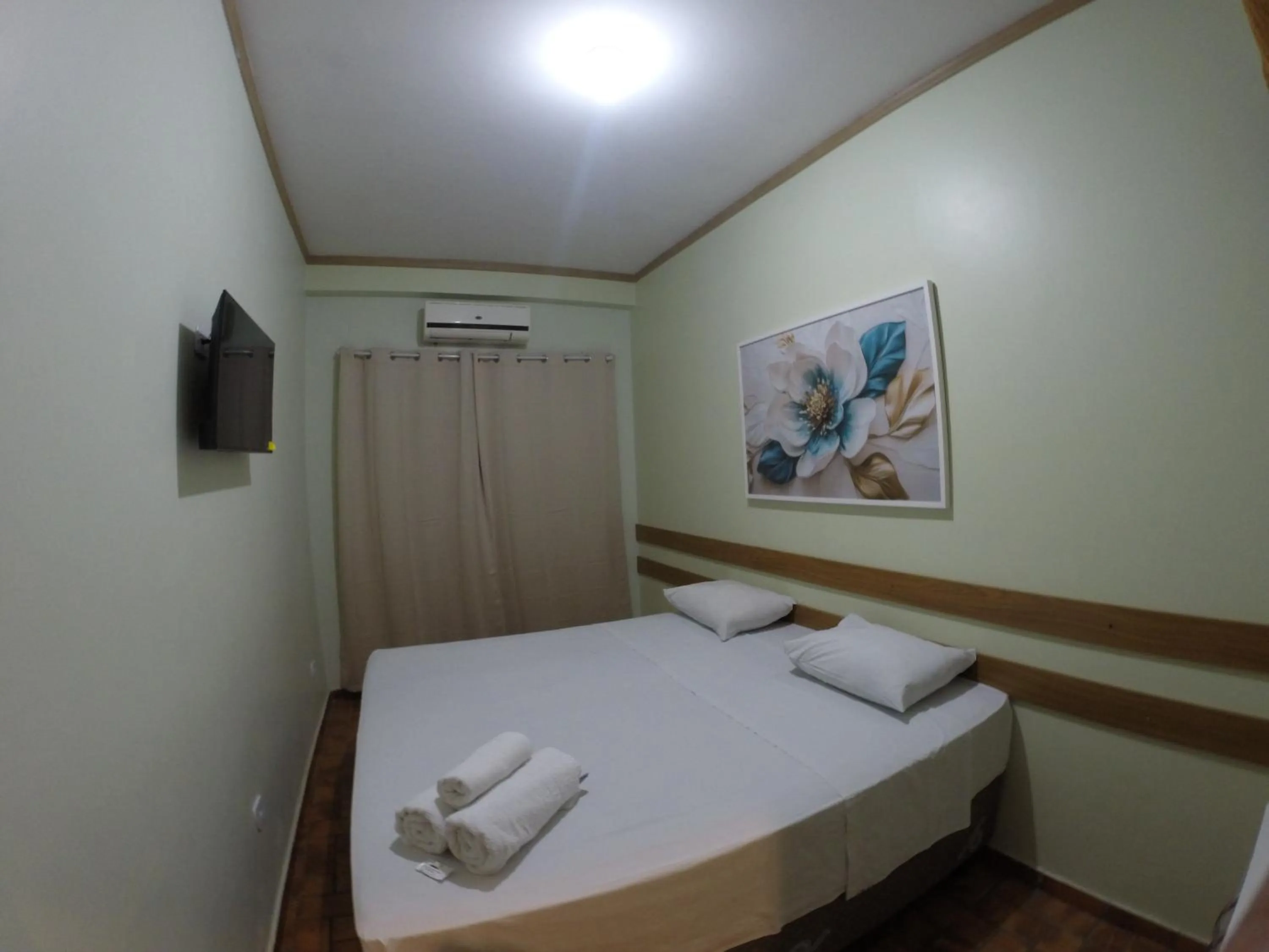 Bed in POUSADA EVELINA