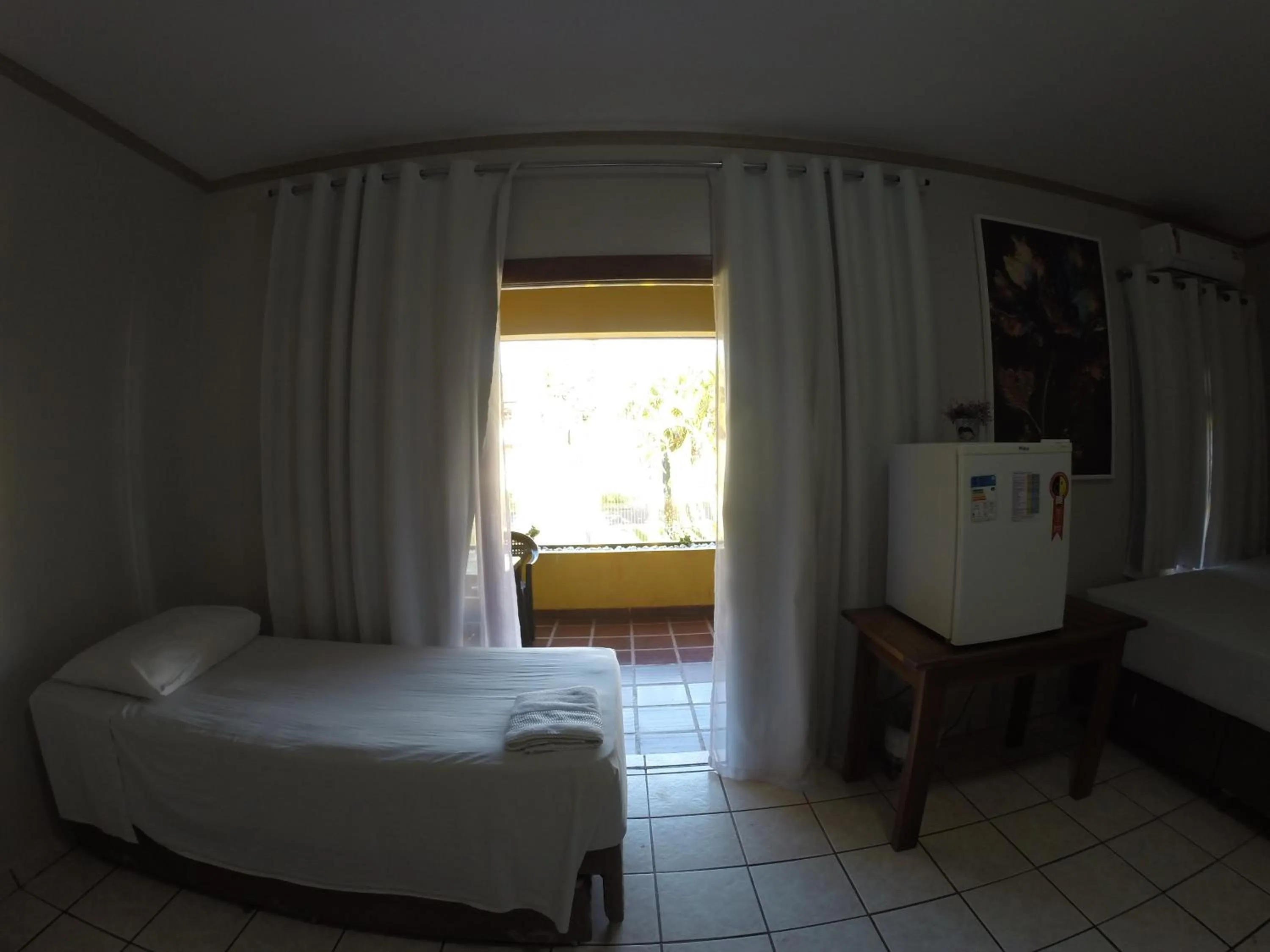 Bed in POUSADA EVELINA