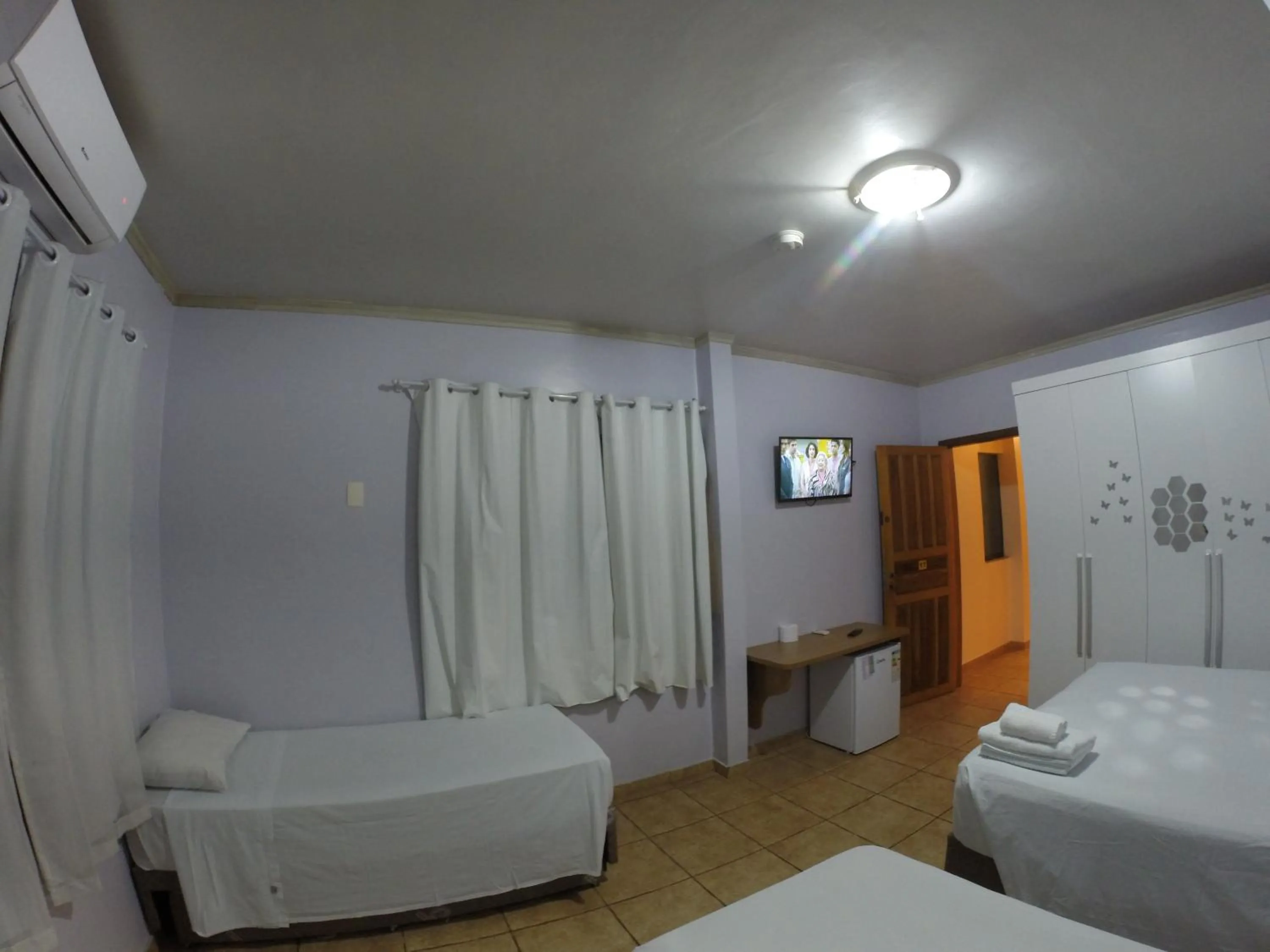 Bed in POUSADA EVELINA