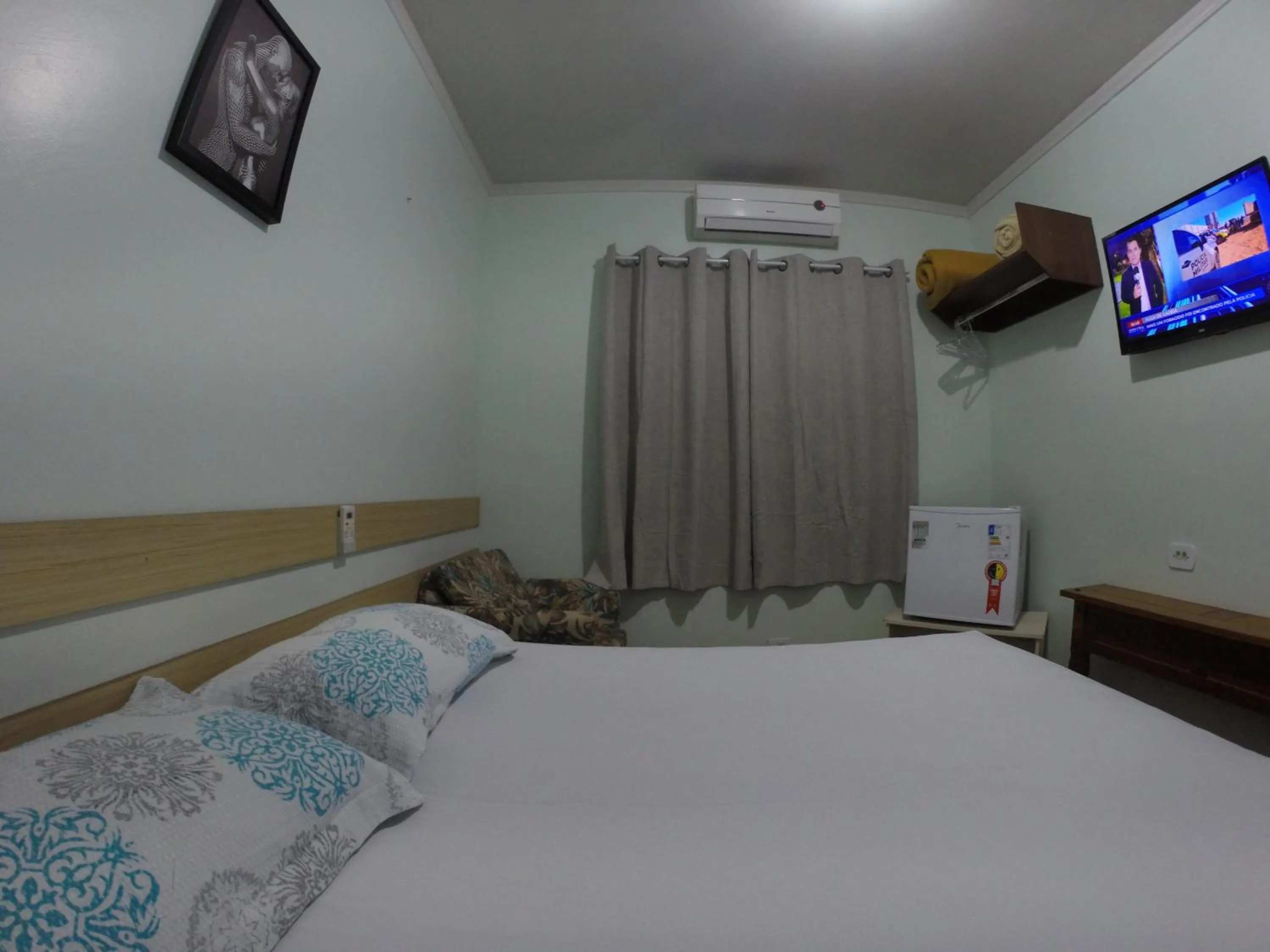 Bed in POUSADA EVELINA