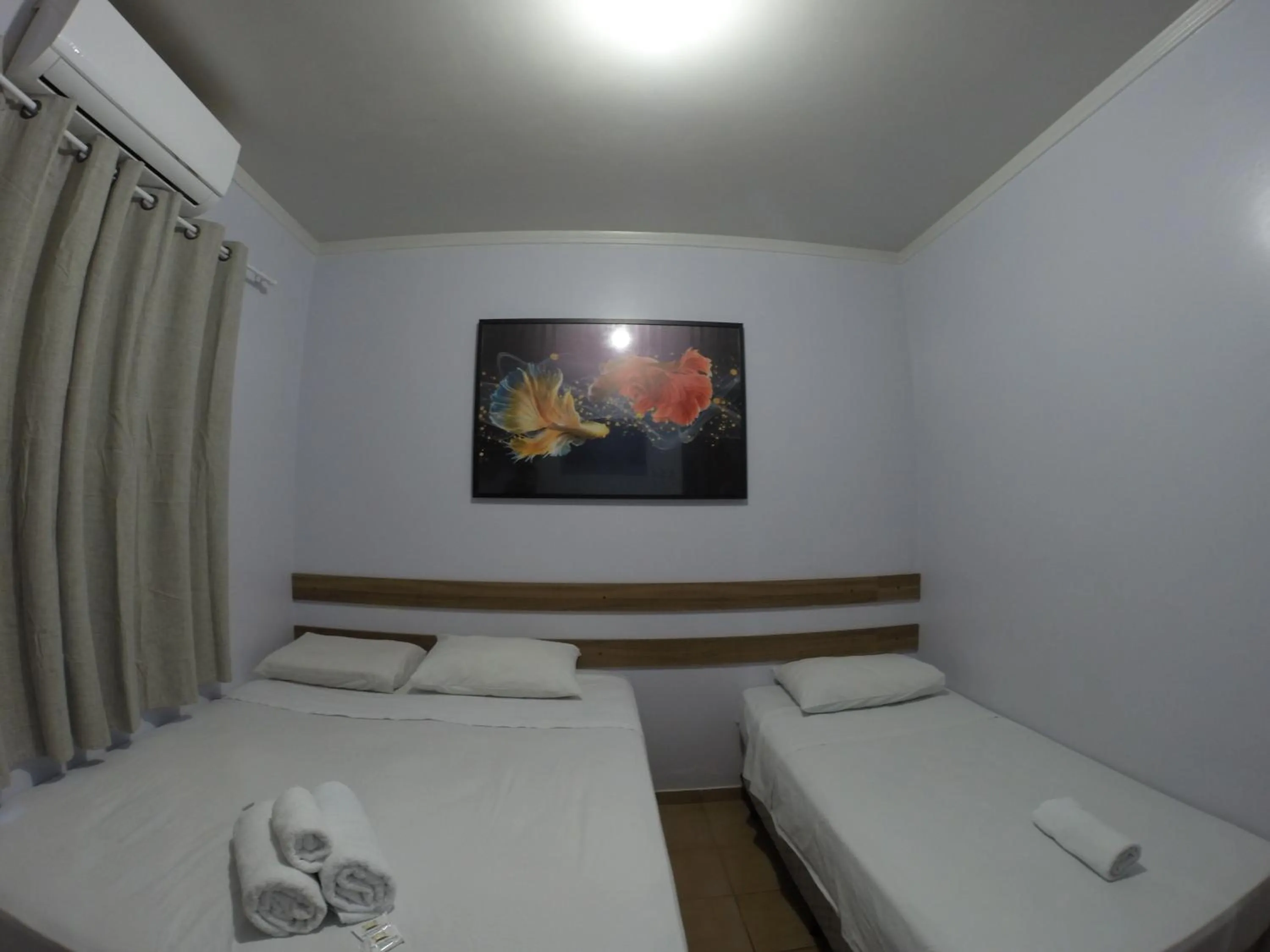 Bed in POUSADA EVELINA