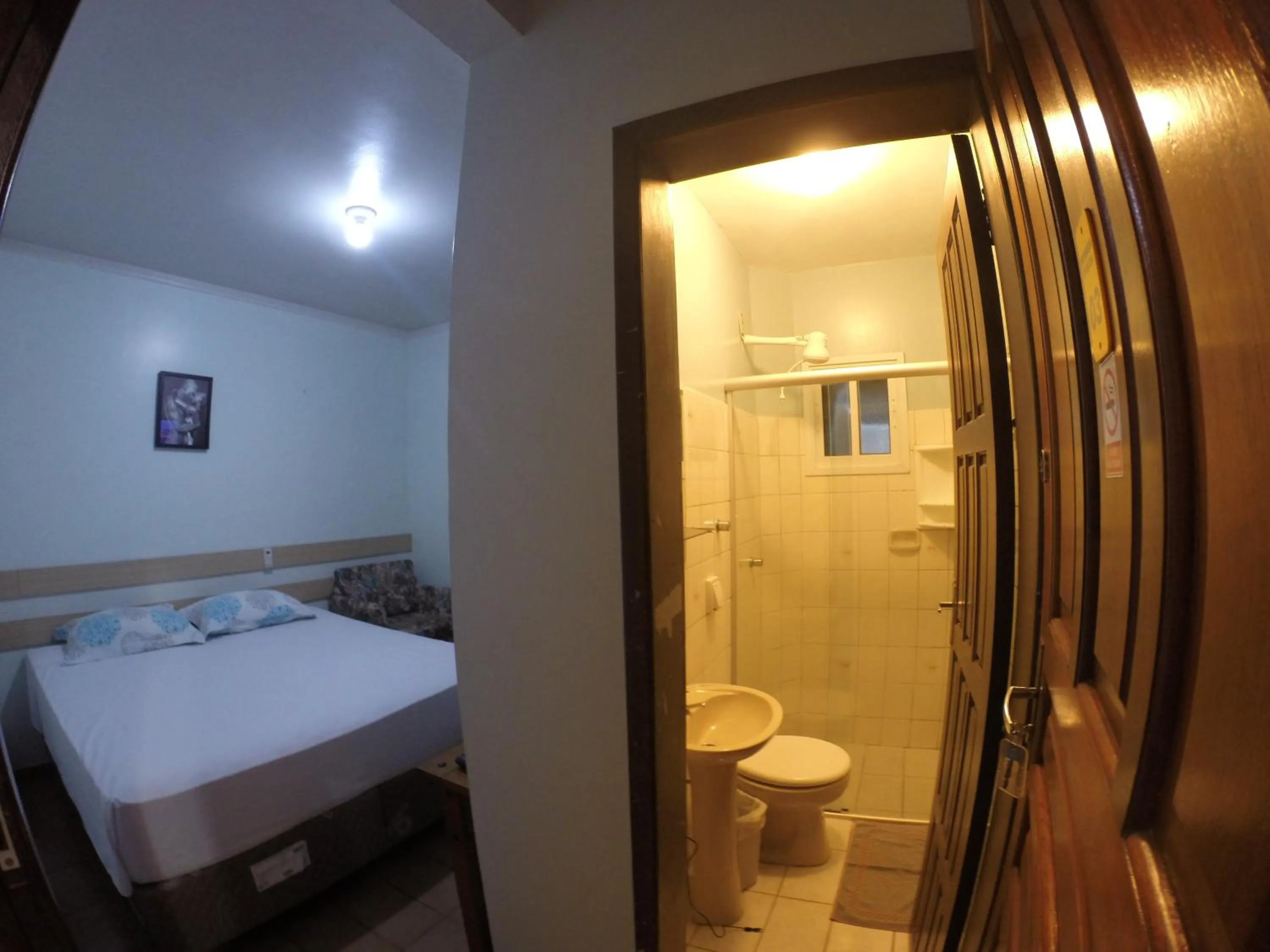 Bed in POUSADA EVELINA