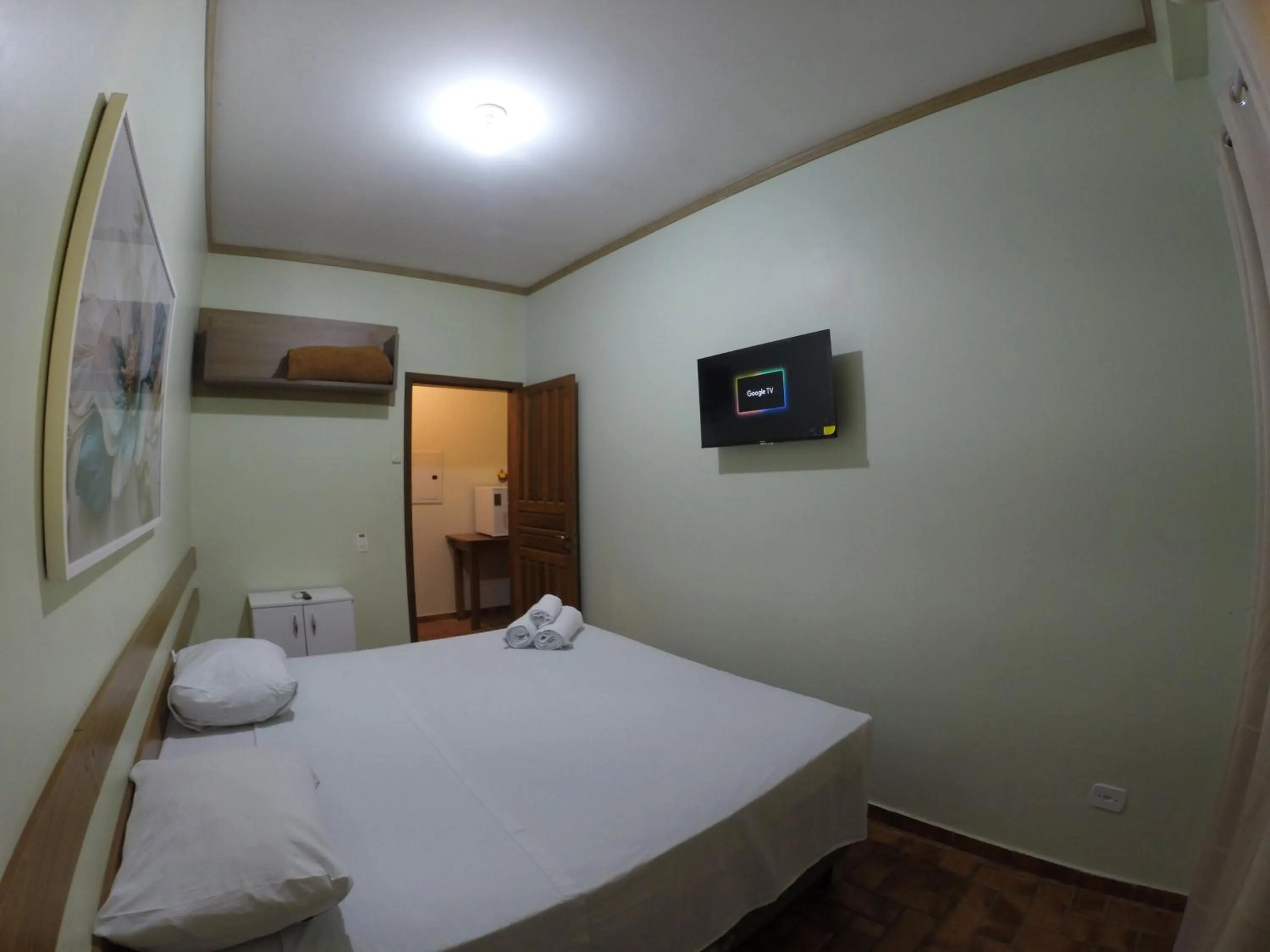 Bed in POUSADA EVELINA