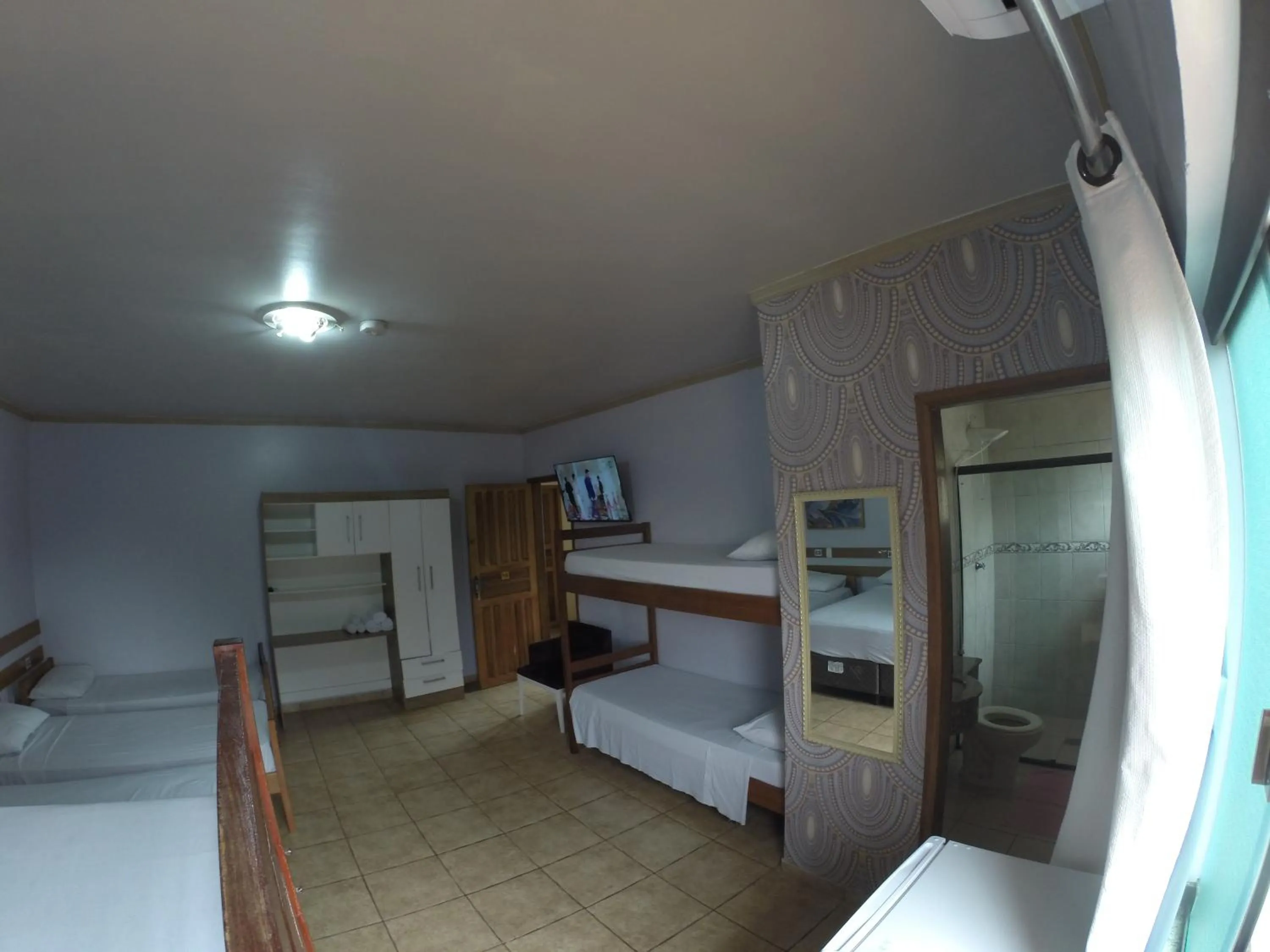 Bed in POUSADA EVELINA