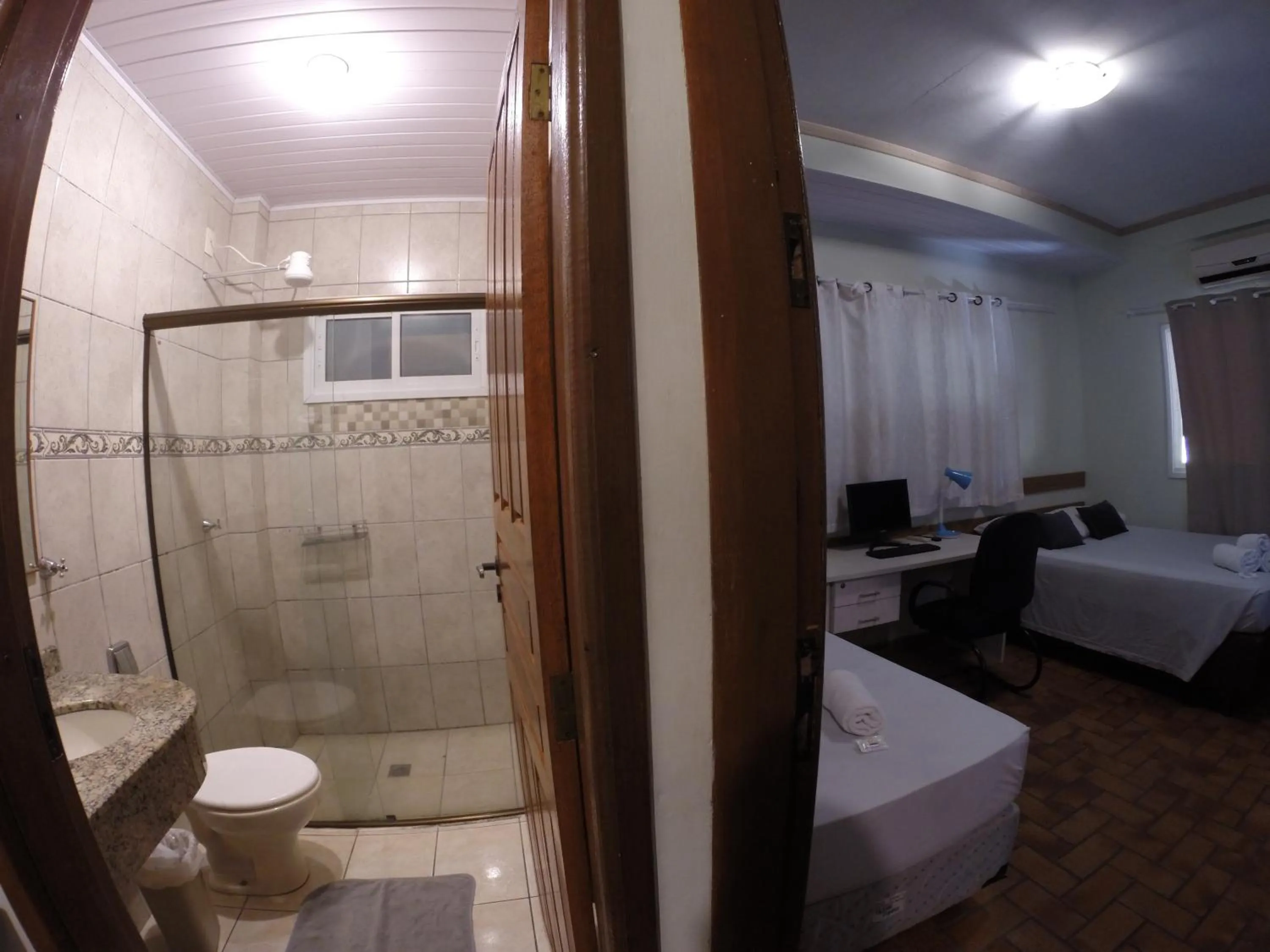 Bed in POUSADA EVELINA