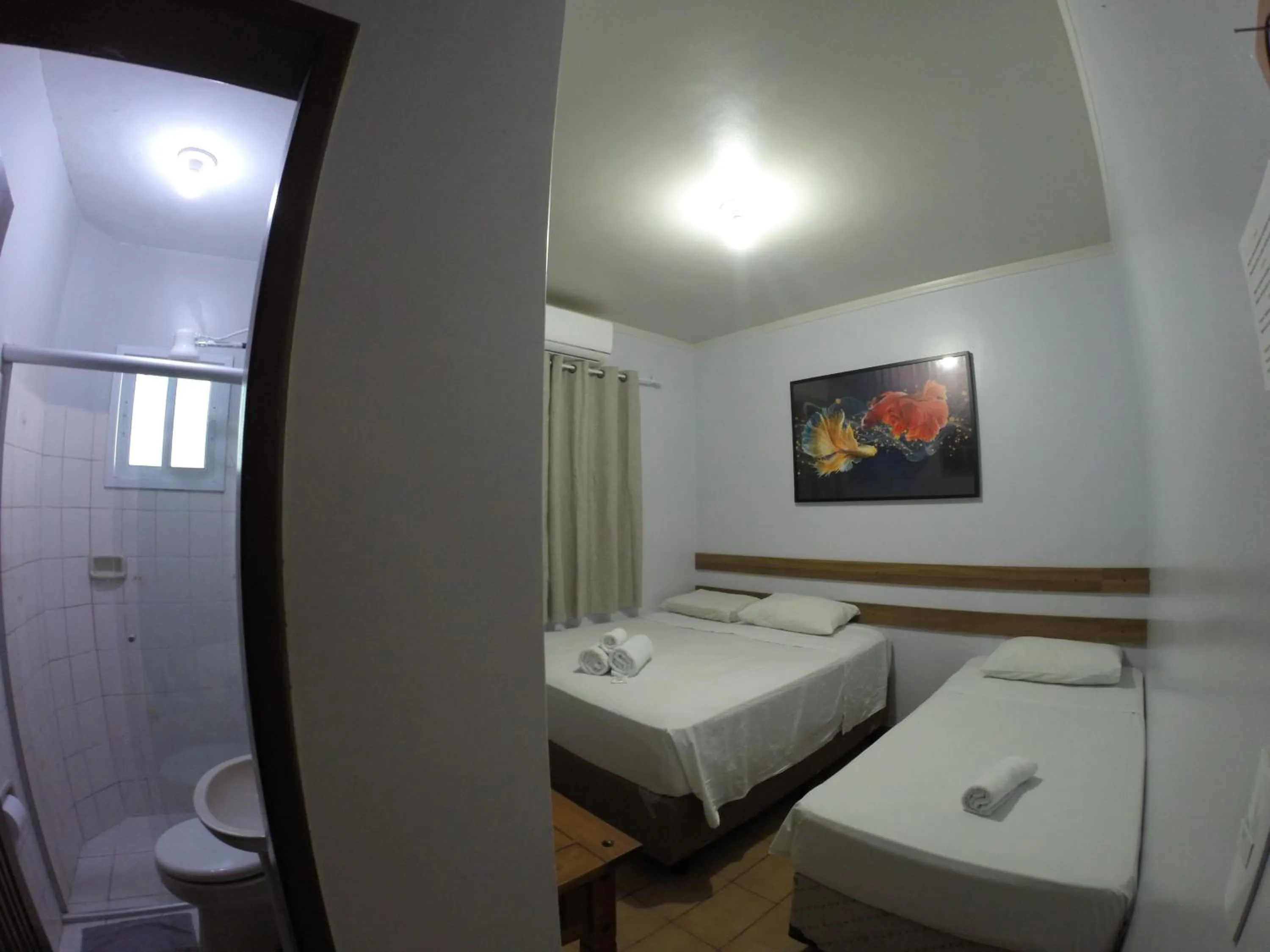 Bed in POUSADA EVELINA