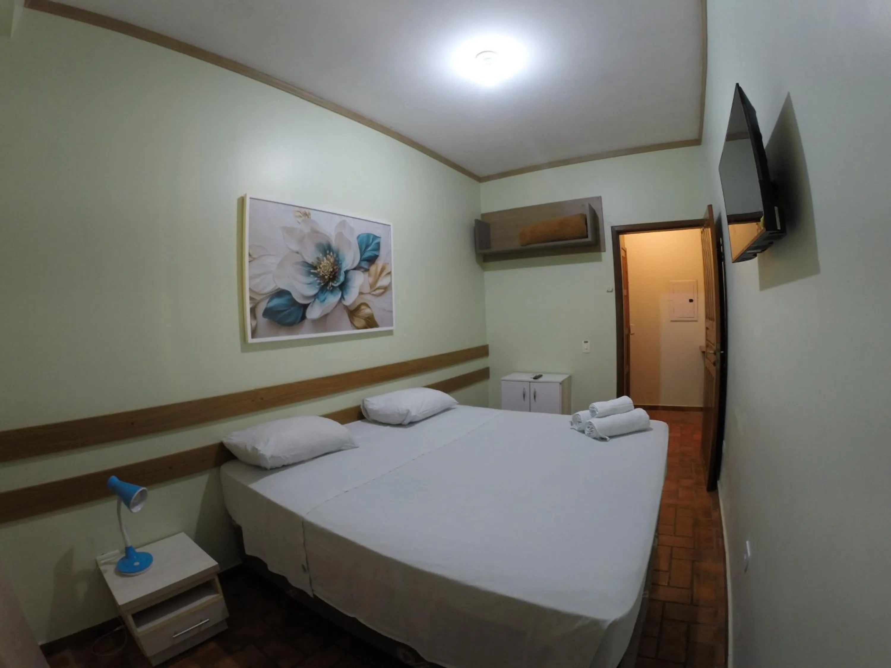 Bed in POUSADA EVELINA