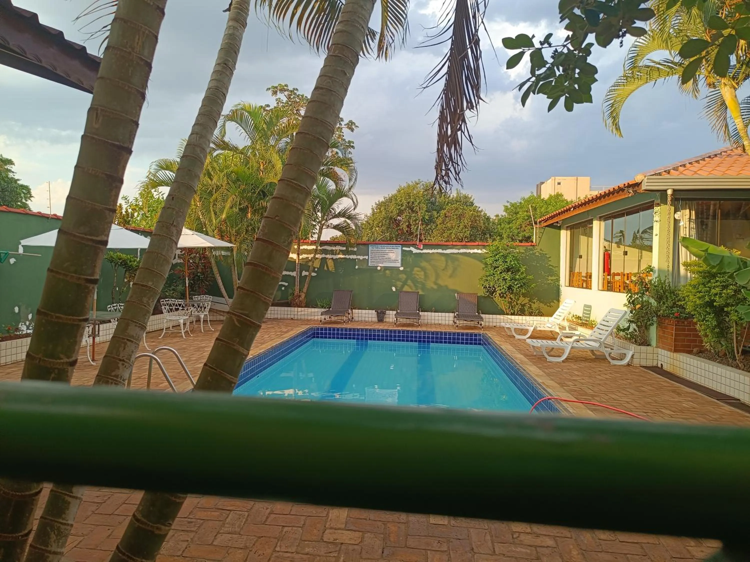 Pool view in POUSADA EVELINA