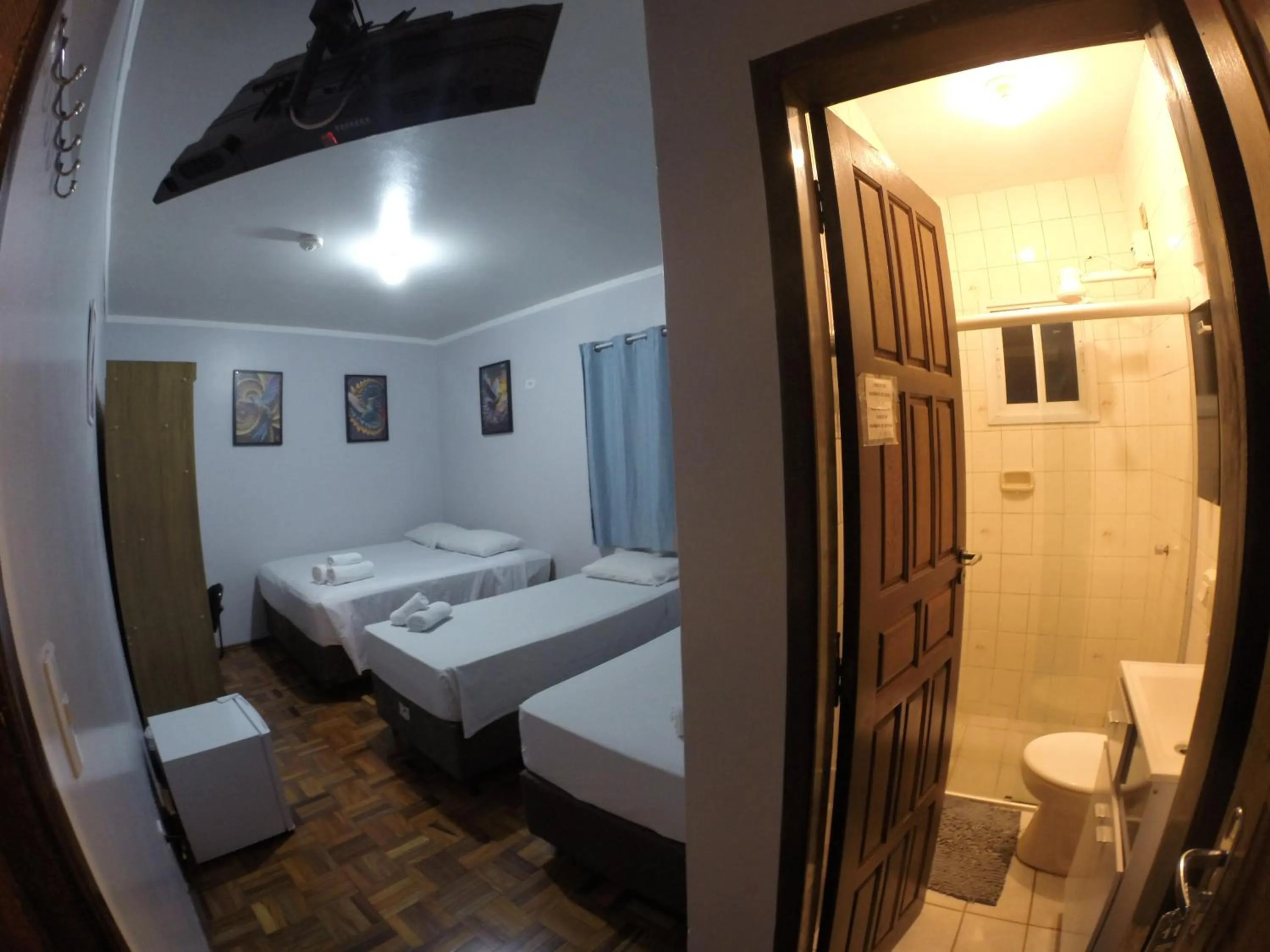 Bed in POUSADA EVELINA