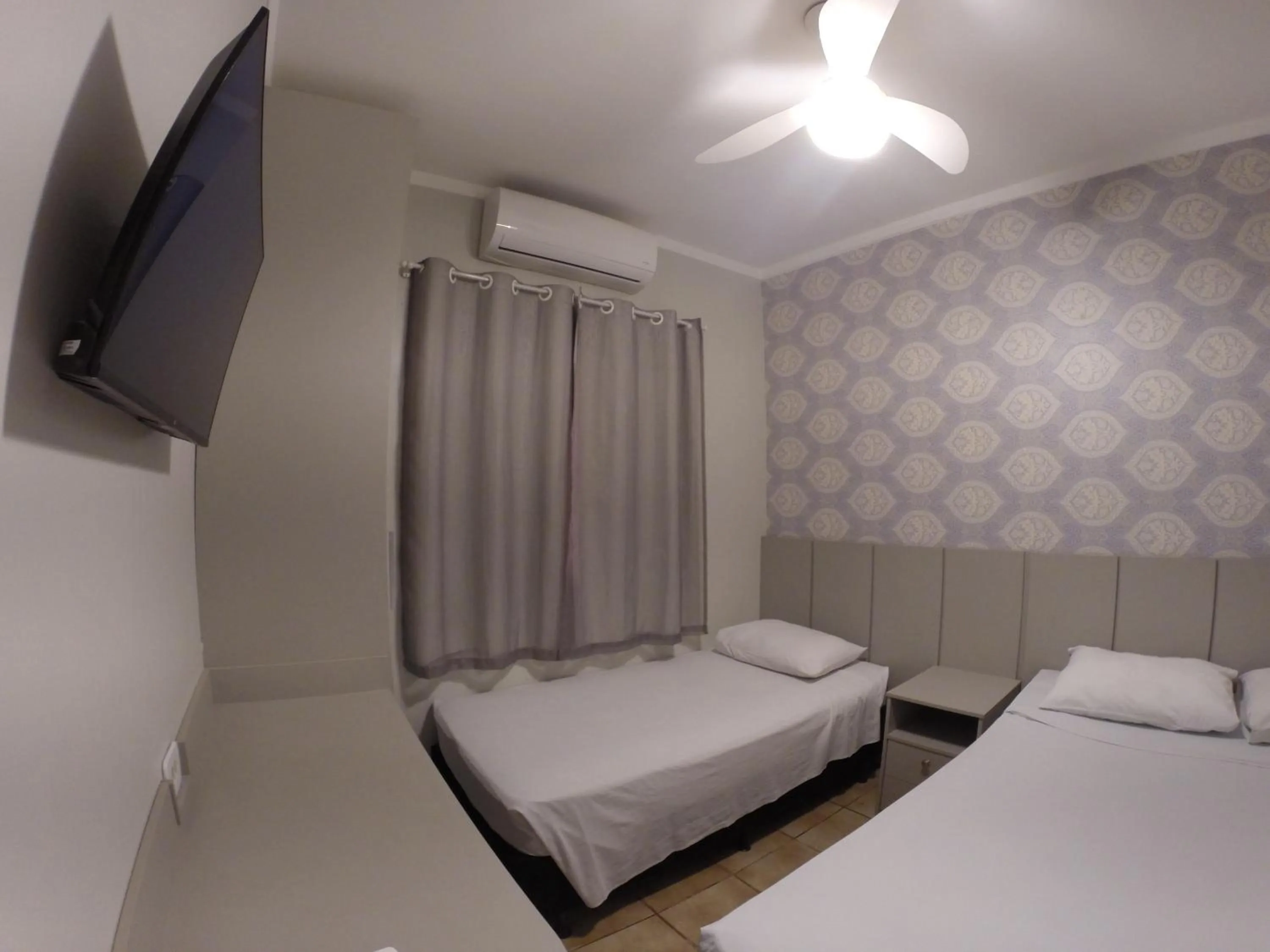 Bed in POUSADA EVELINA