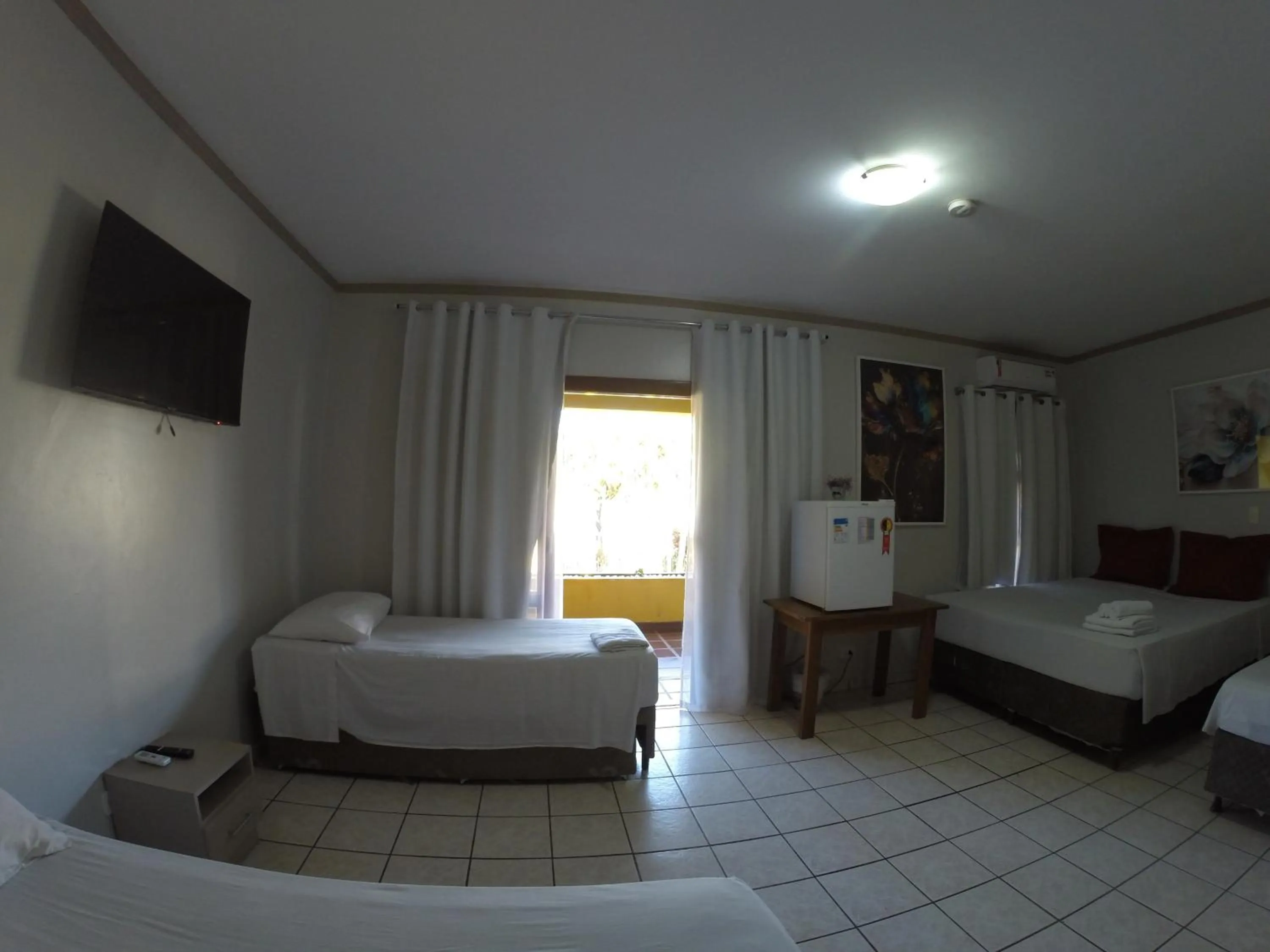 Bed in POUSADA EVELINA