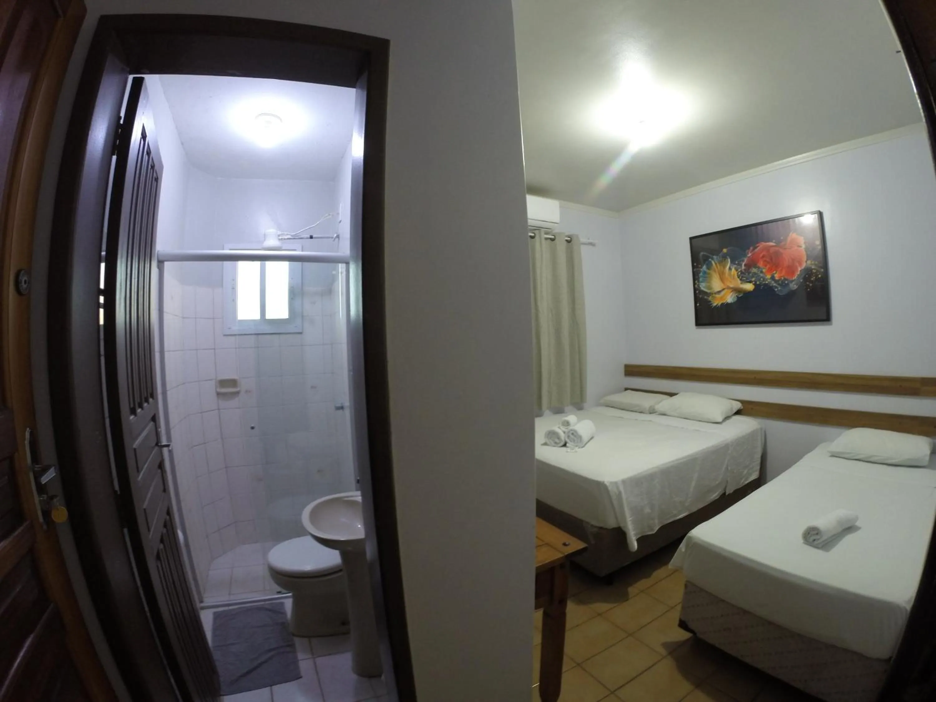 Bed in POUSADA EVELINA