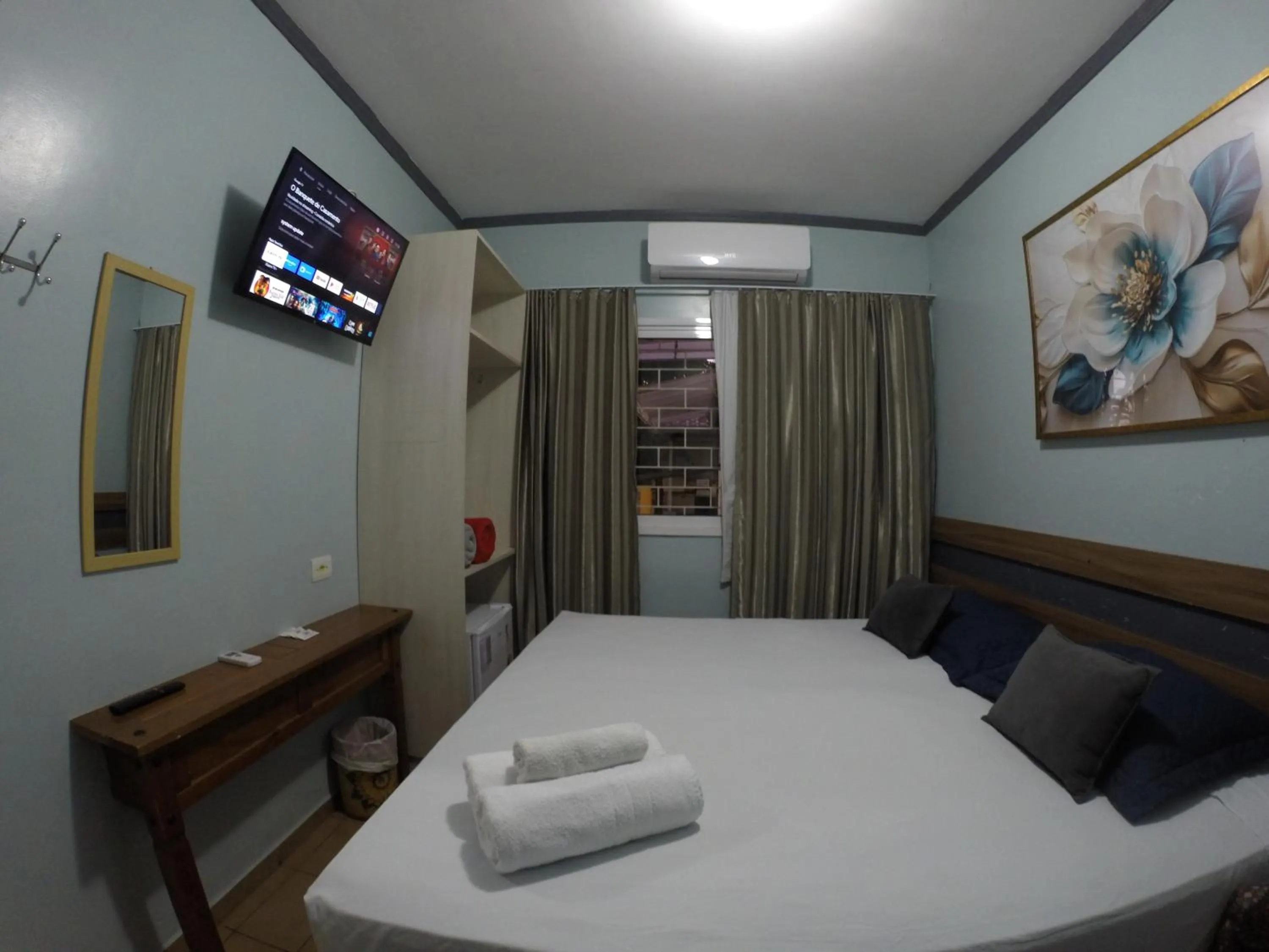 Bed in POUSADA EVELINA