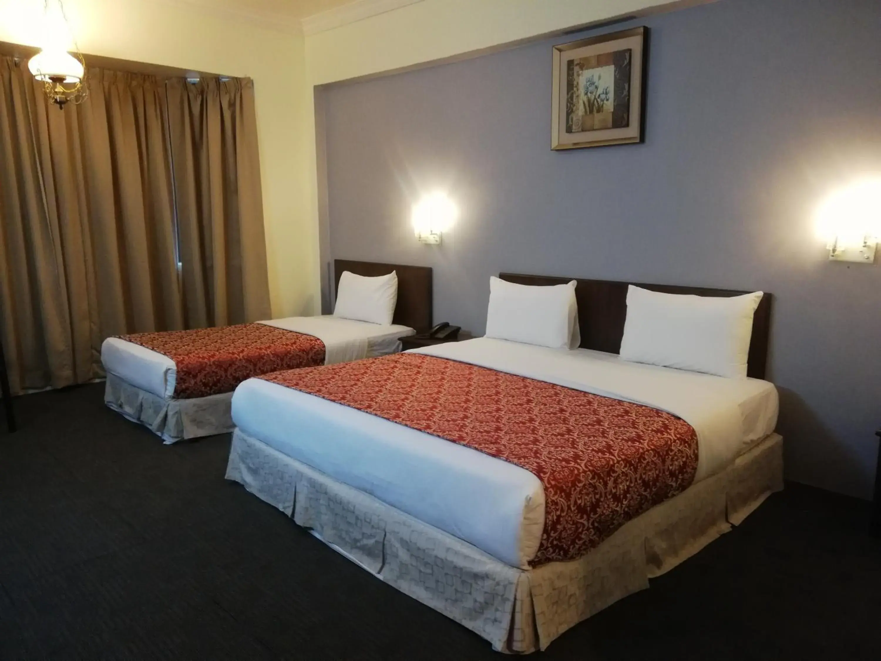 Bed in Hotel Damai