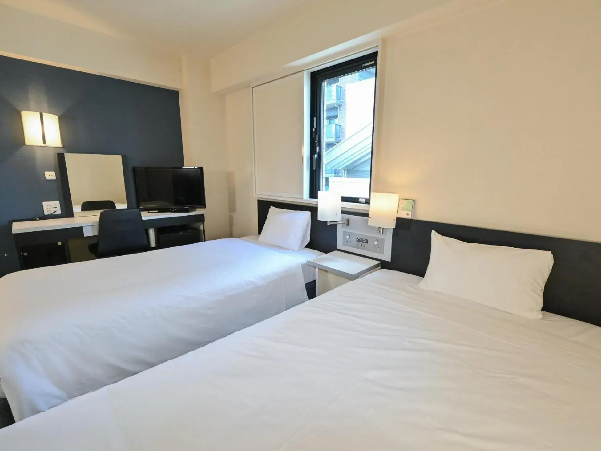 Photo of the whole room, Bed in Sanco Inn Nagoya Fushimi Photo of the whole room, Bed in Sanco Inn Nagoya Fushimi