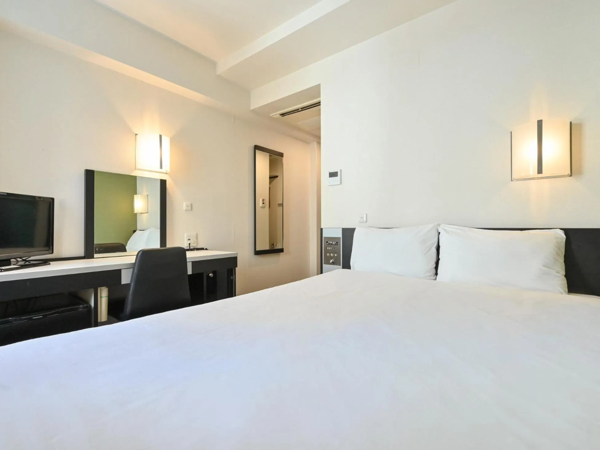 Photo of the whole room, Bed in Sanco Inn Nagoya Fushimi