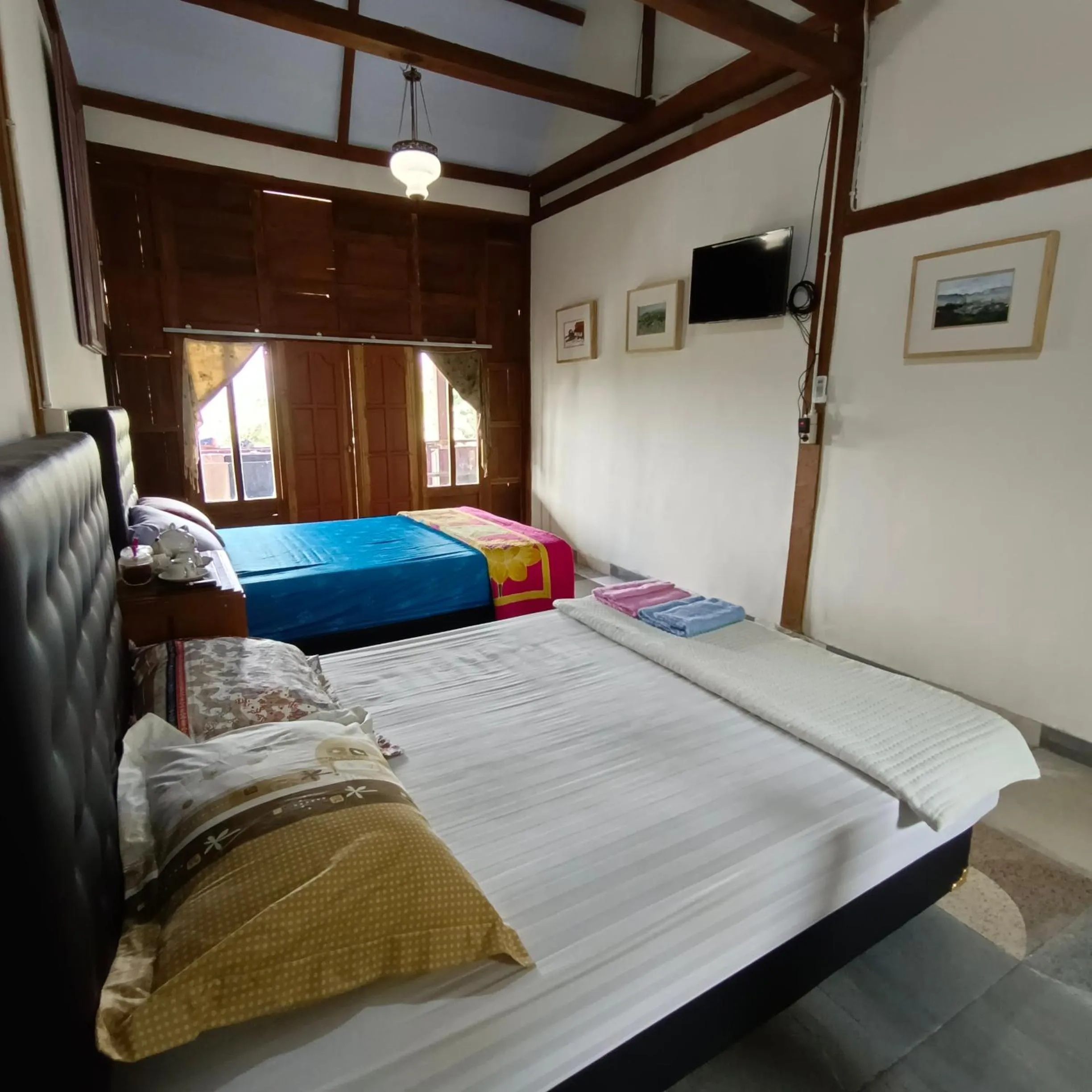 Bed in Omah Singo Stay & Resto Yogyakarta