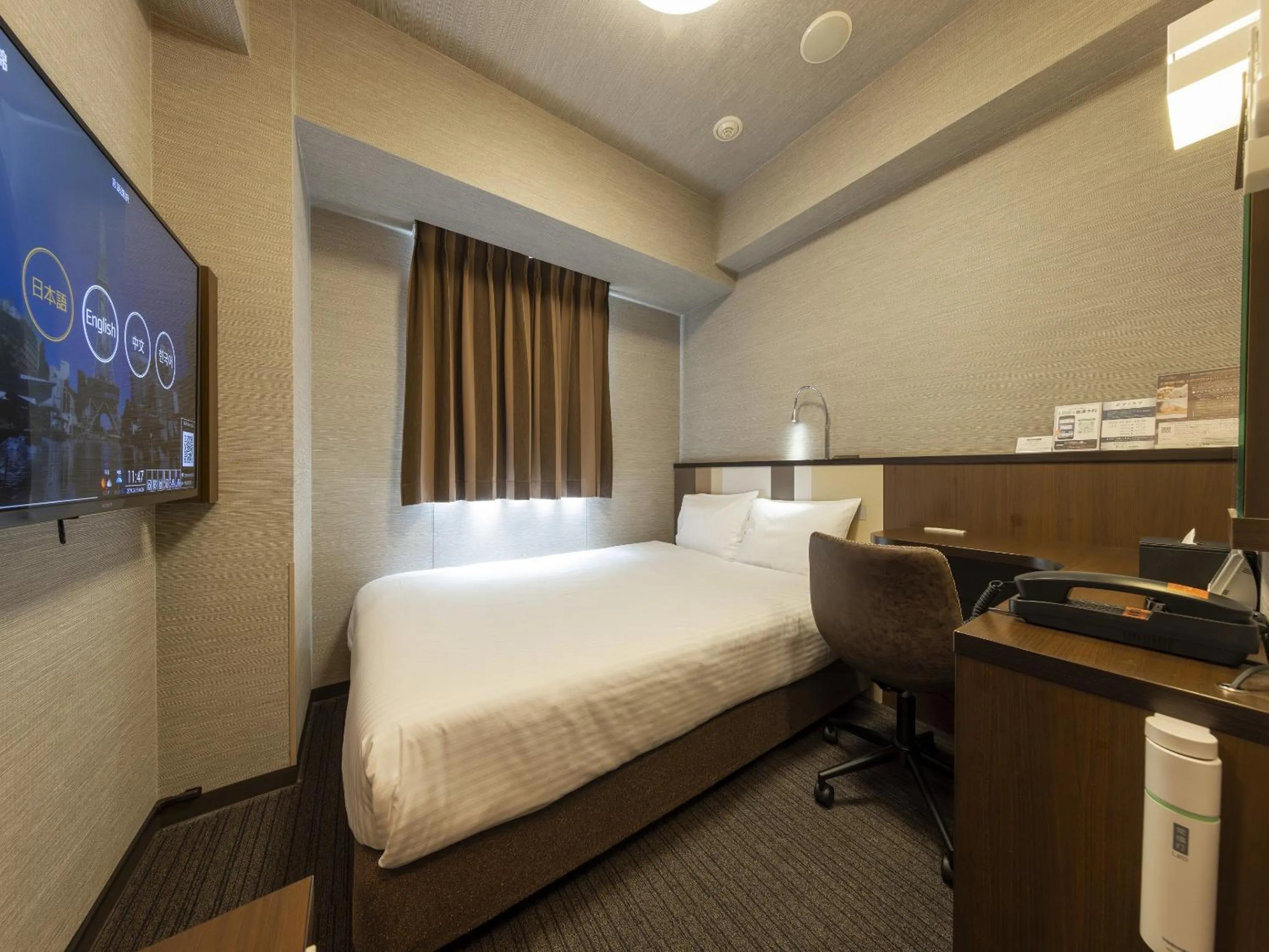 Photo of the whole room, Bed in Sanco Inn Nagoya Nishiki Shikinoyu