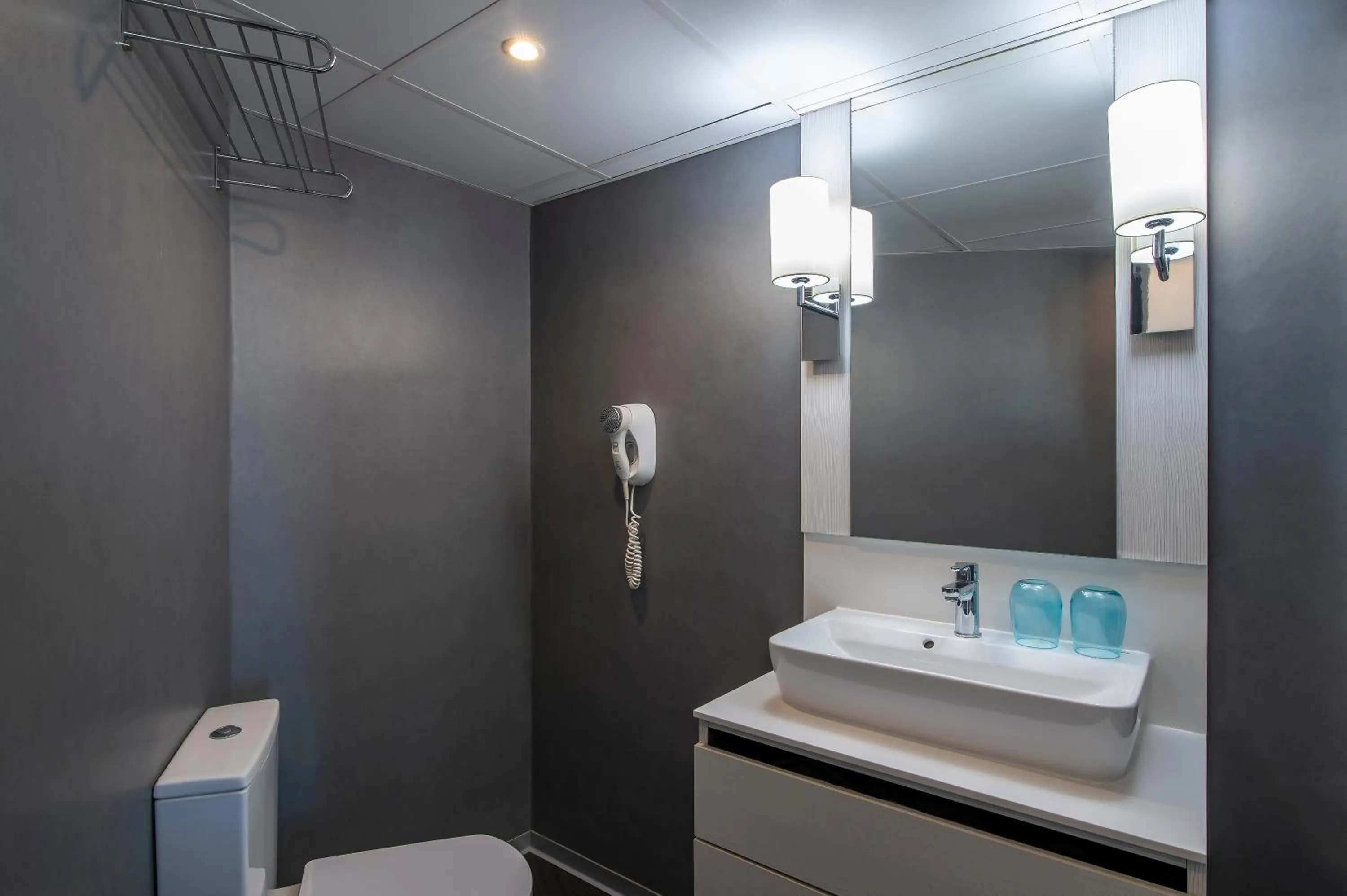 Bathroom in Hotel El Puerto by Pierre Vacances