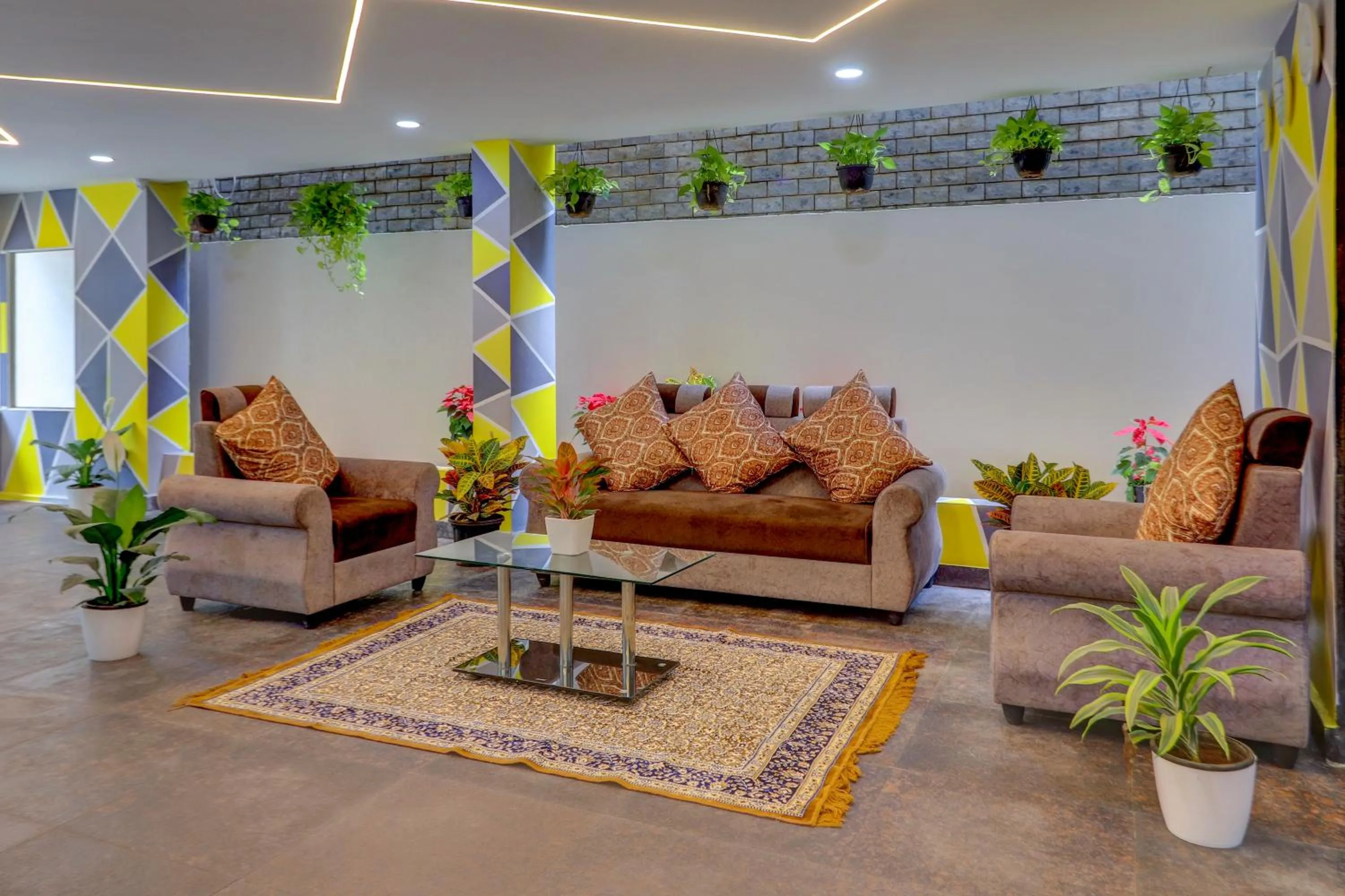 Seating area in Destino By INR Suites