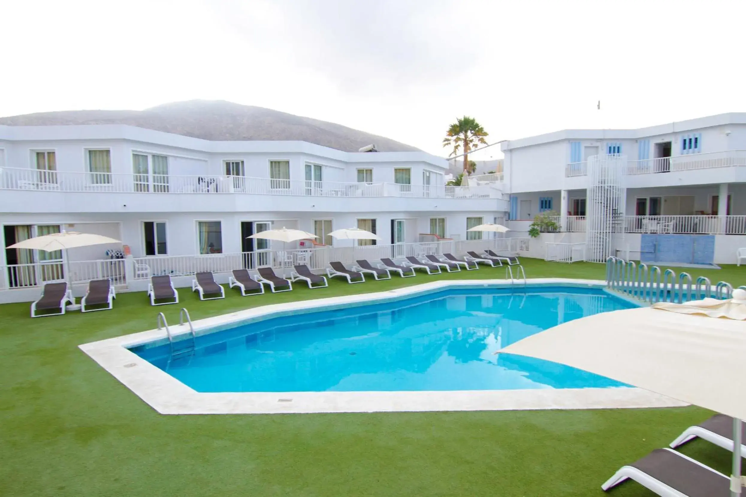 Swimming pool in Checkin Bungalows Atlántida Swimming pool in Checkin Bungalows Atlántida