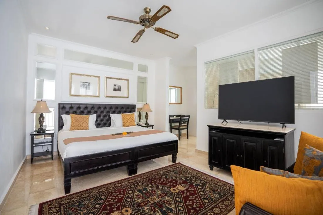 TV and multimedia, Bed in The Colony Hotel Bali