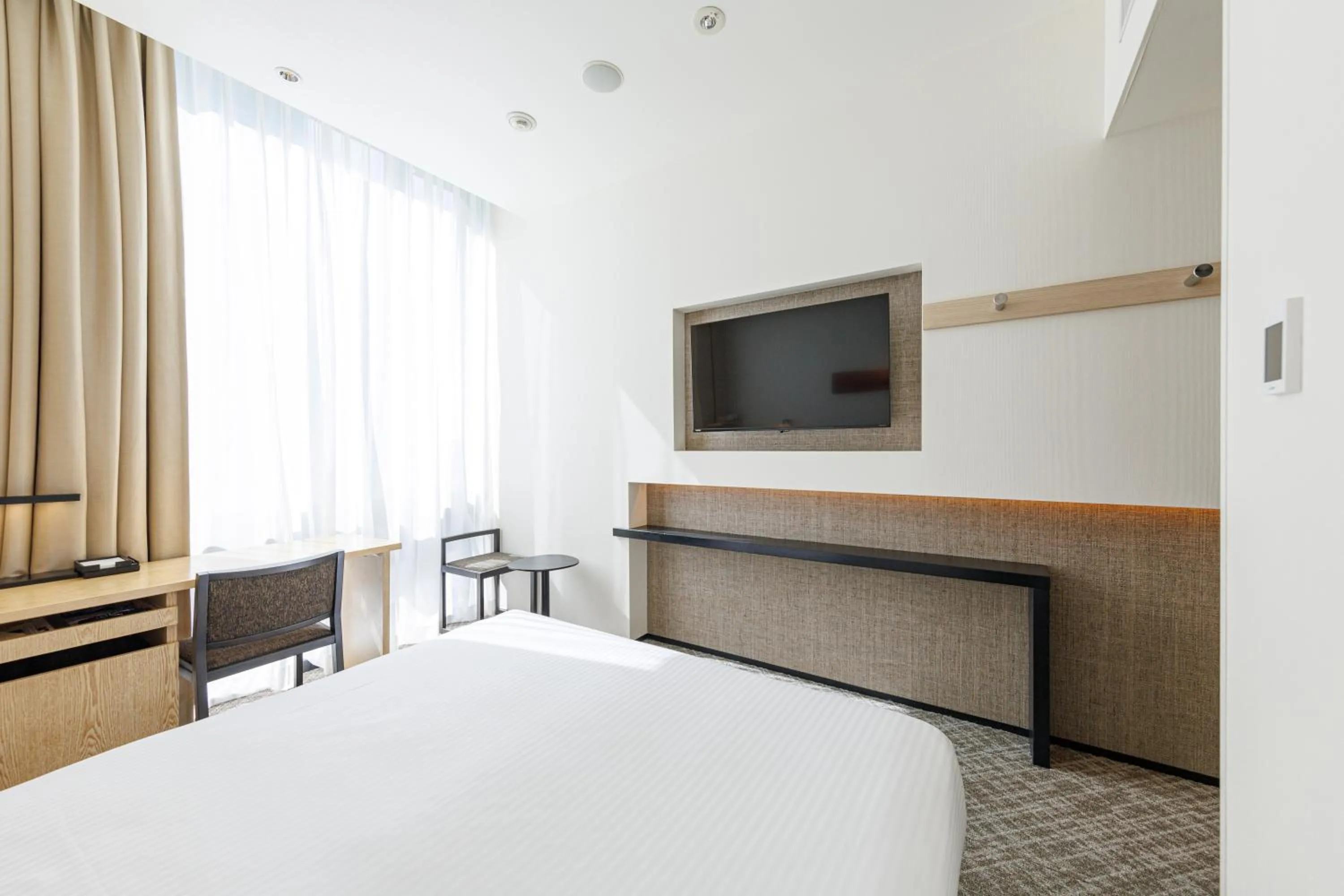 Decorative detail, Bed in JR Kyushu Hotel Blossom Shinjuku