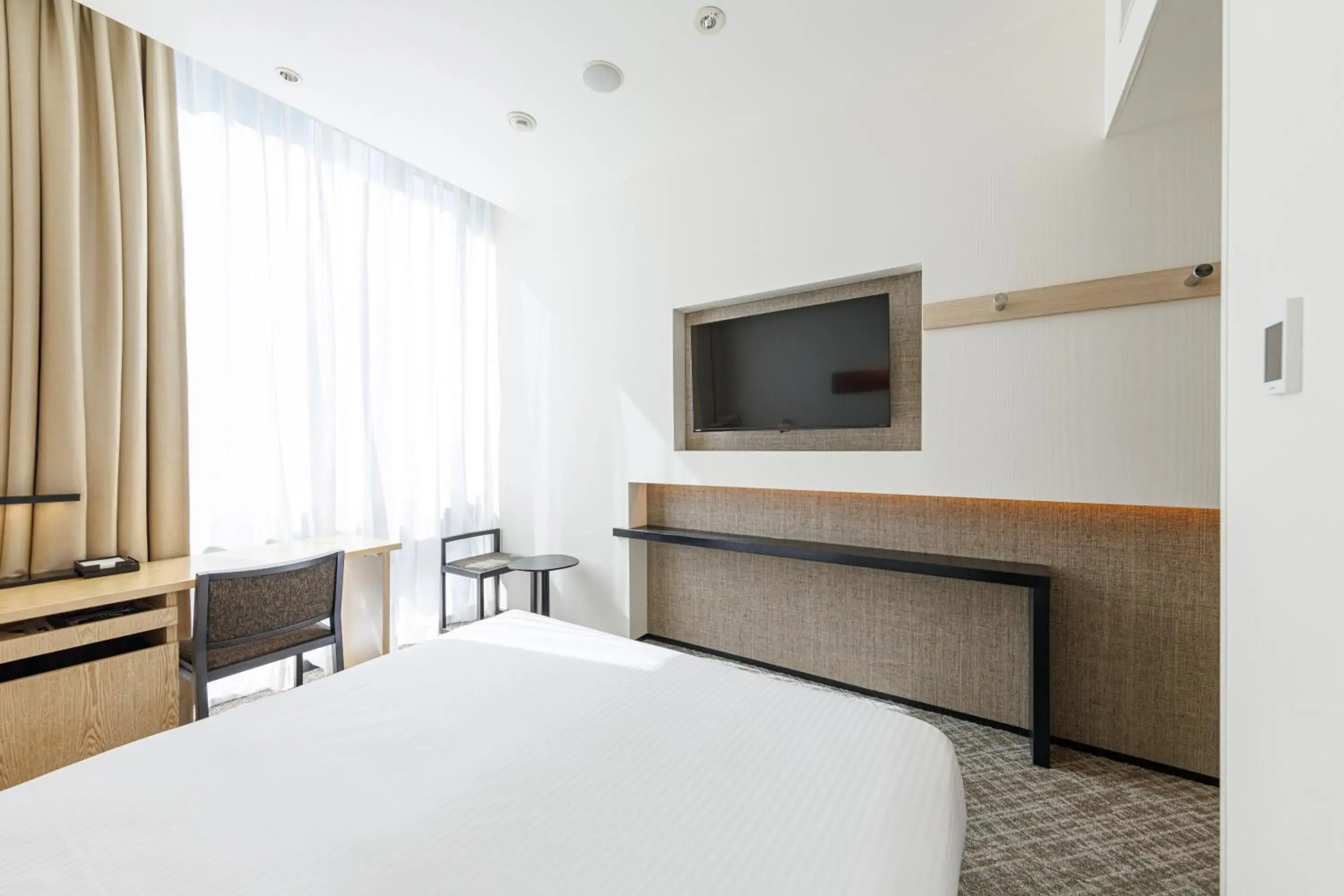 Decorative detail, Bed in JR Kyushu Hotel Blossom Shinjuku Decorative detail, Bed in JR Kyushu Hotel Blossom Shinjuku