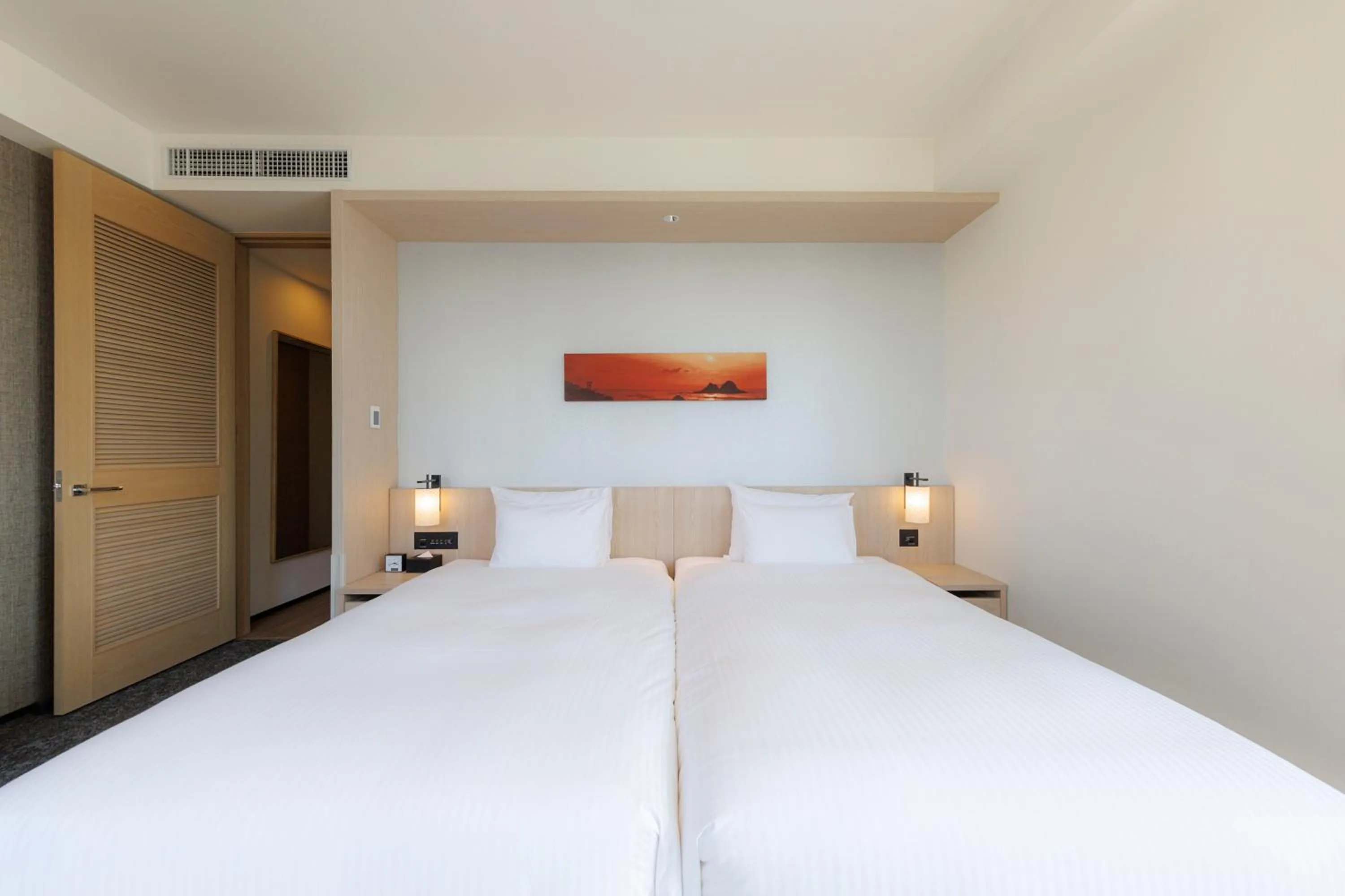 Bed in JR Kyushu Hotel Blossom Shinjuku