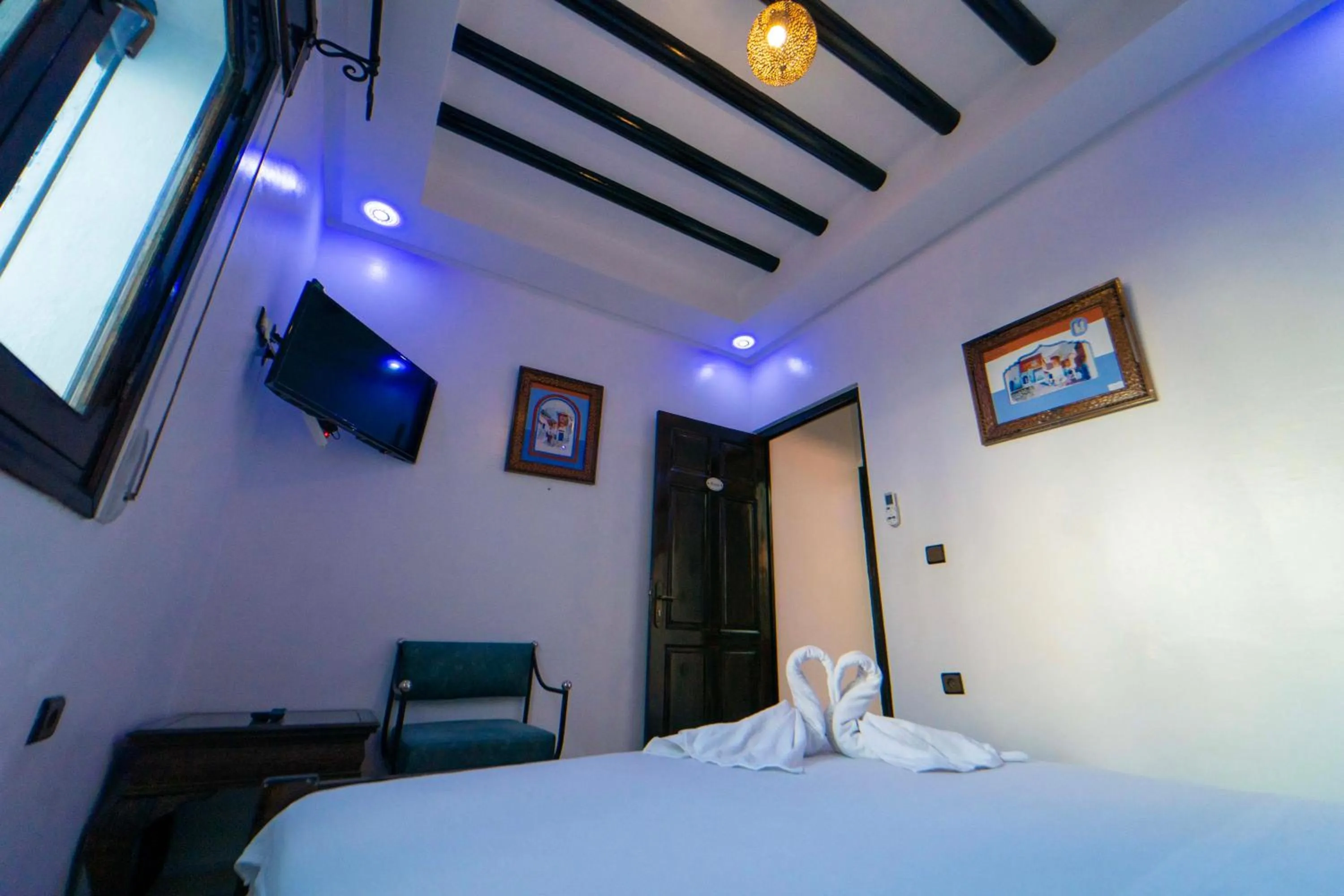 Bed in Maison d'hôtes Afassi