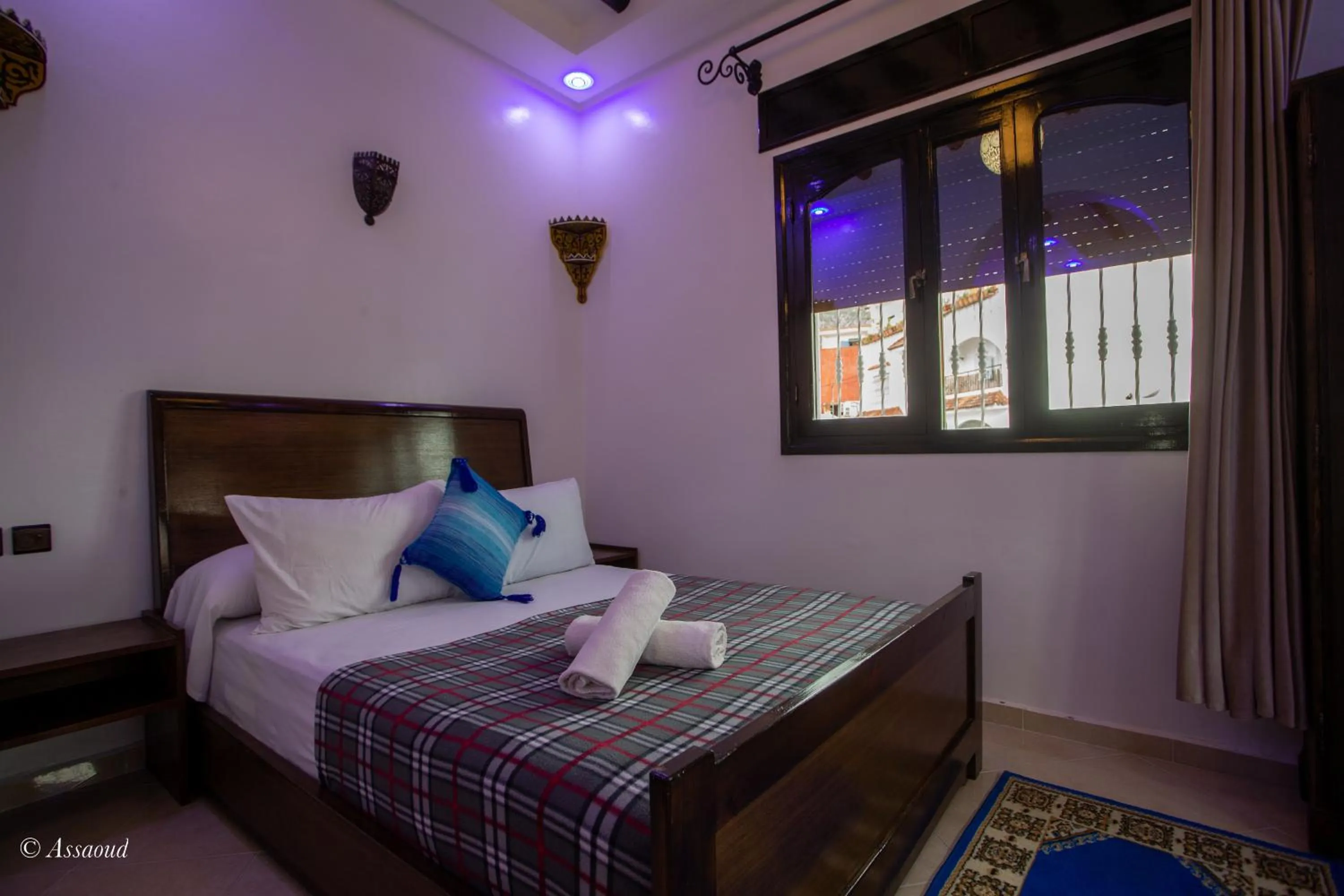 Bed in Maison d'hôtes Afassi