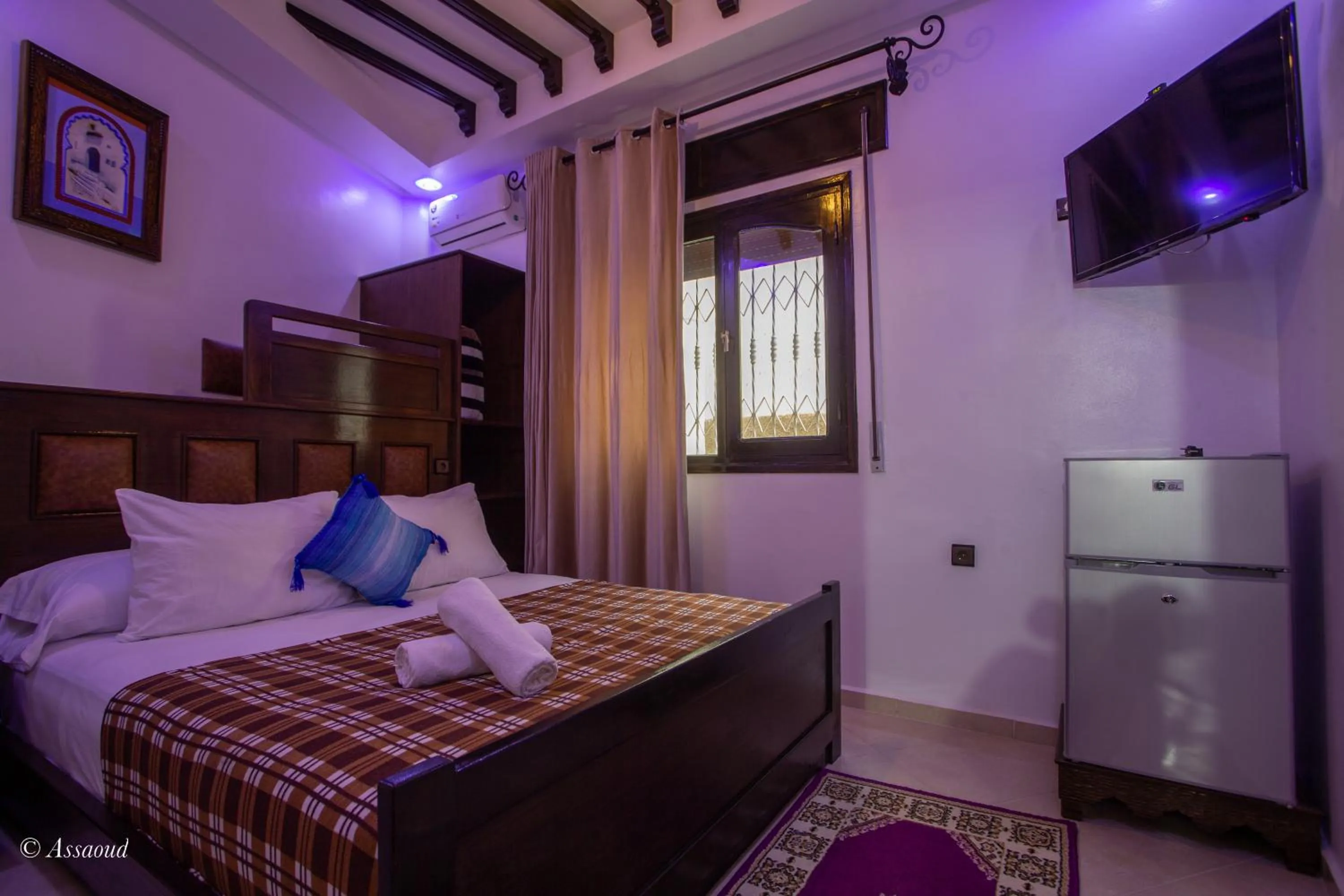 Bed in Maison d'hôtes Afassi