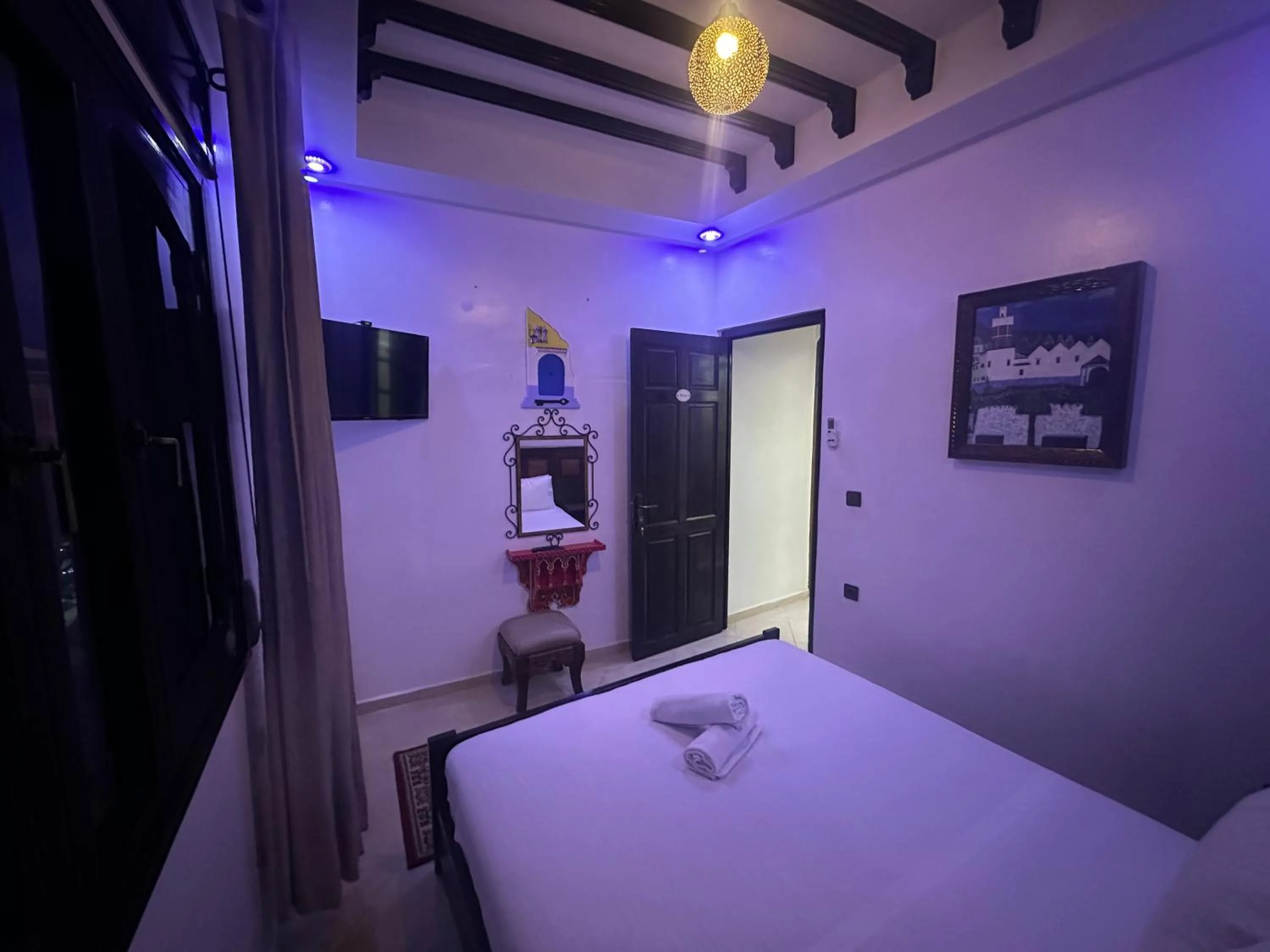 Bed in Maison d'hôtes Afassi