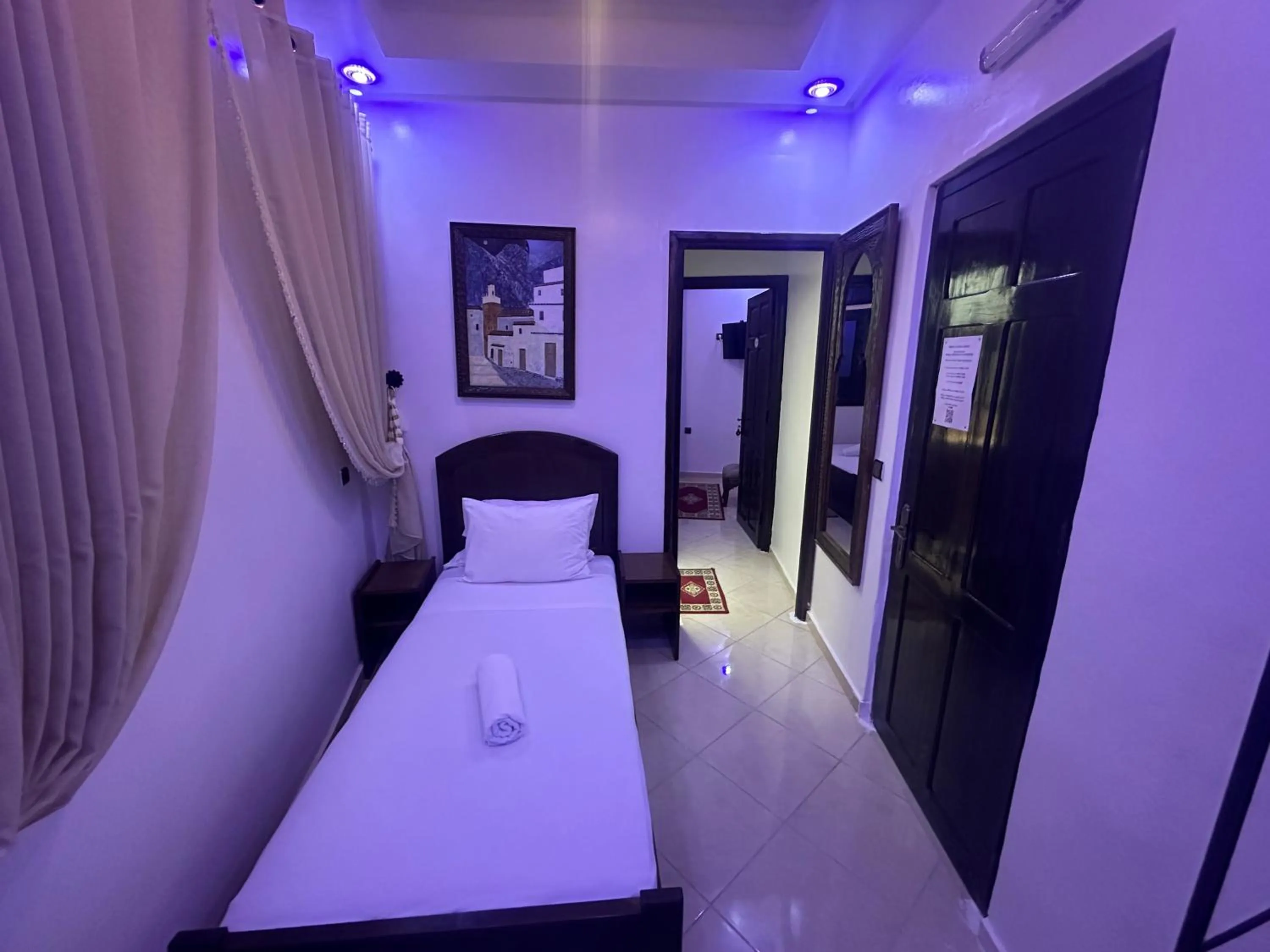 Bed in Maison d'hôtes Afassi