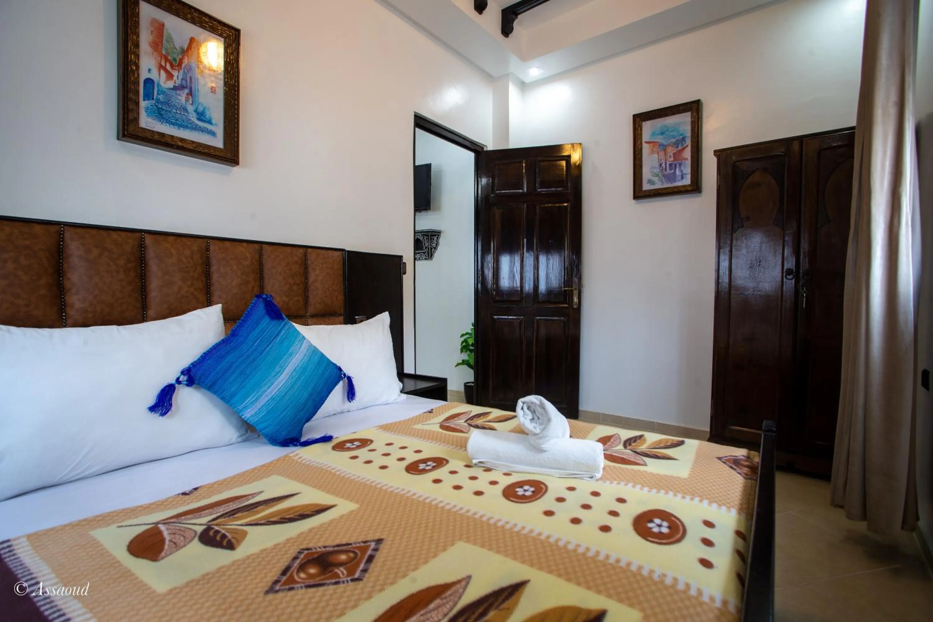 Bed in Maison d'hôtes Afassi