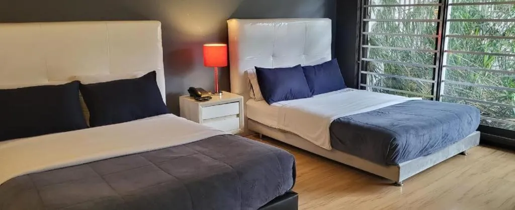 Bed in HOTEL BOUTIQUE CASA LOZADA