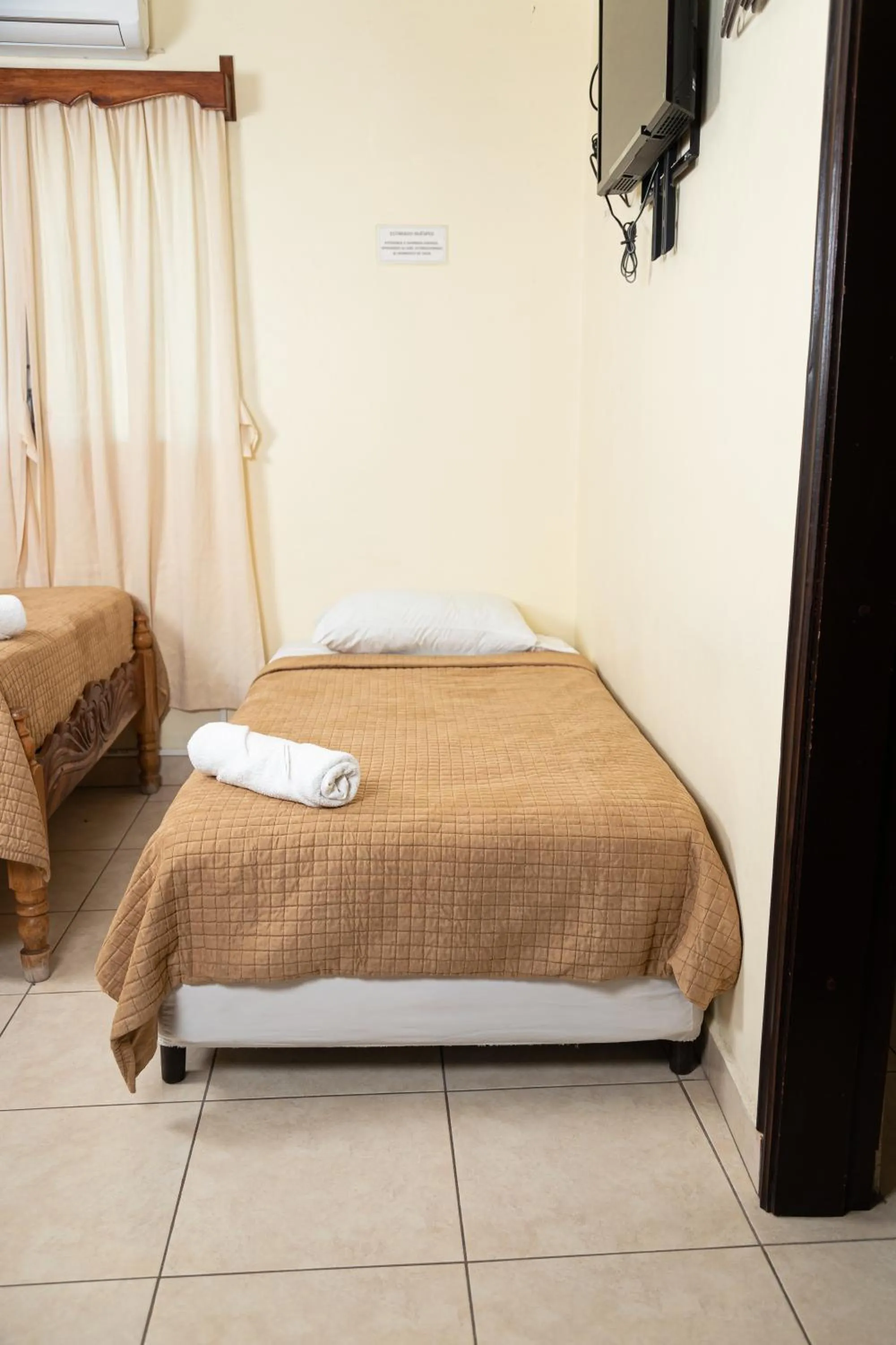 Bed in Hotel Internacional Palmerola