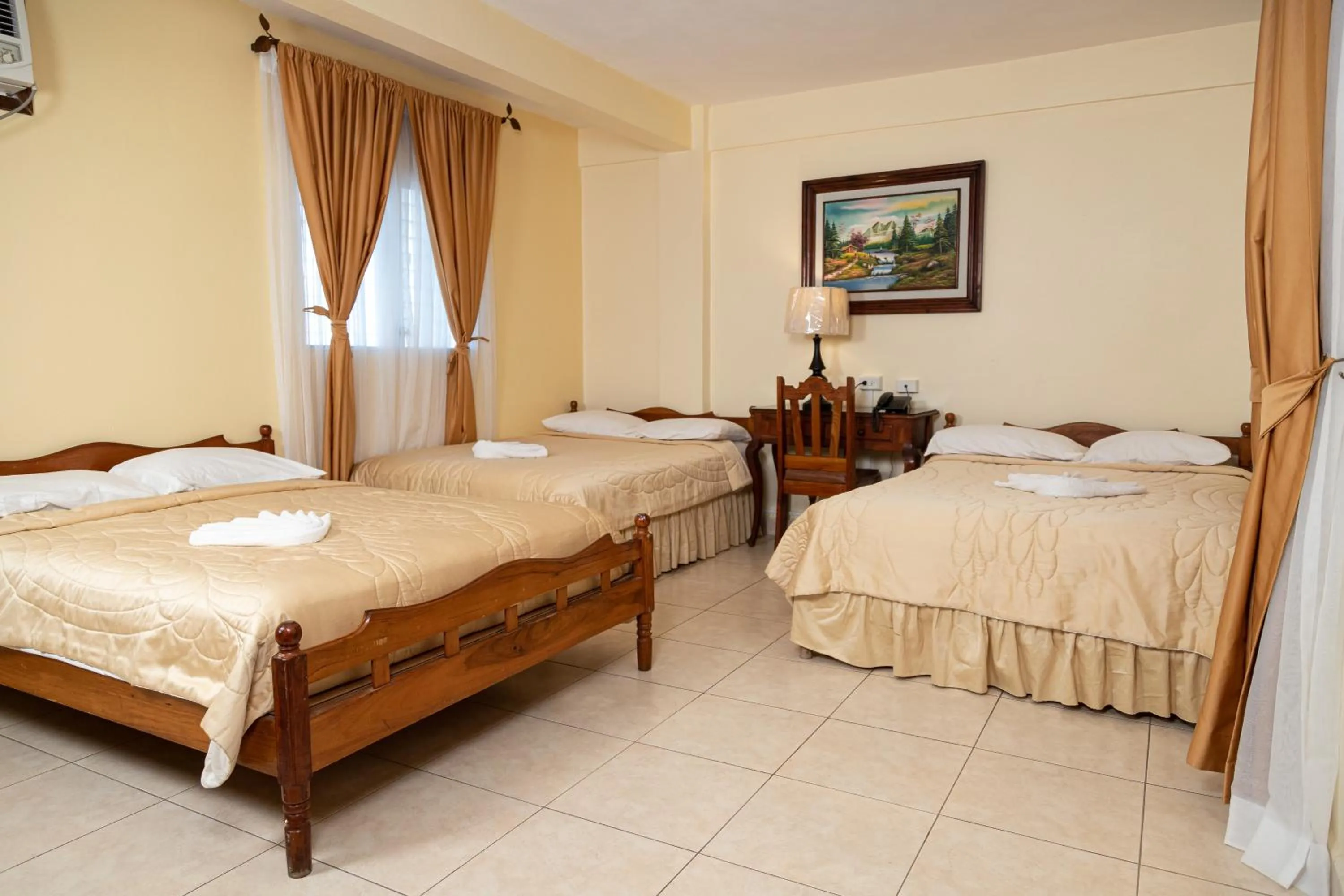 Bed in Hotel Internacional Palmerola