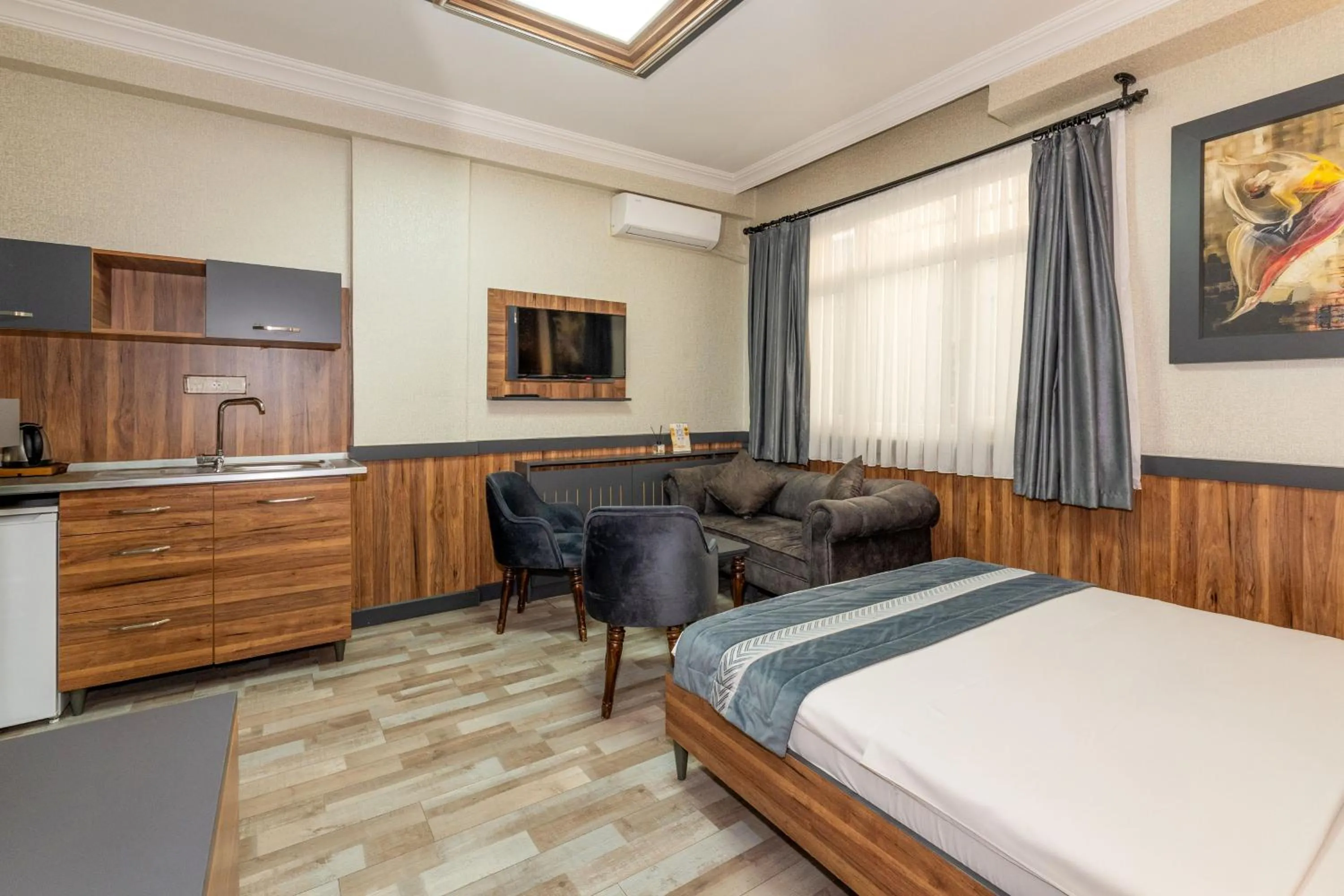 Bed in La Serena Taxim Hotel