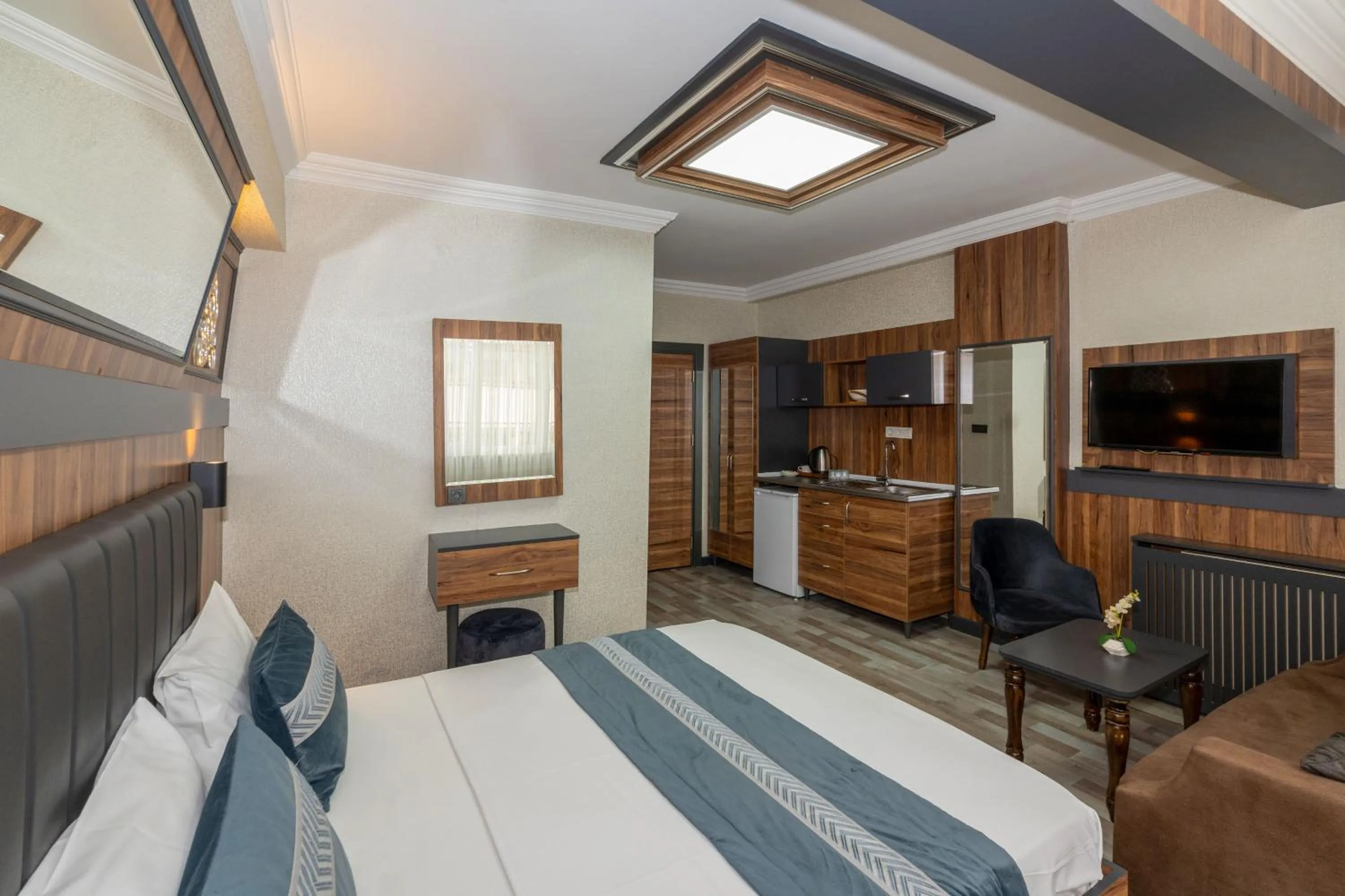 Bed in La Serena Taxim Hotel