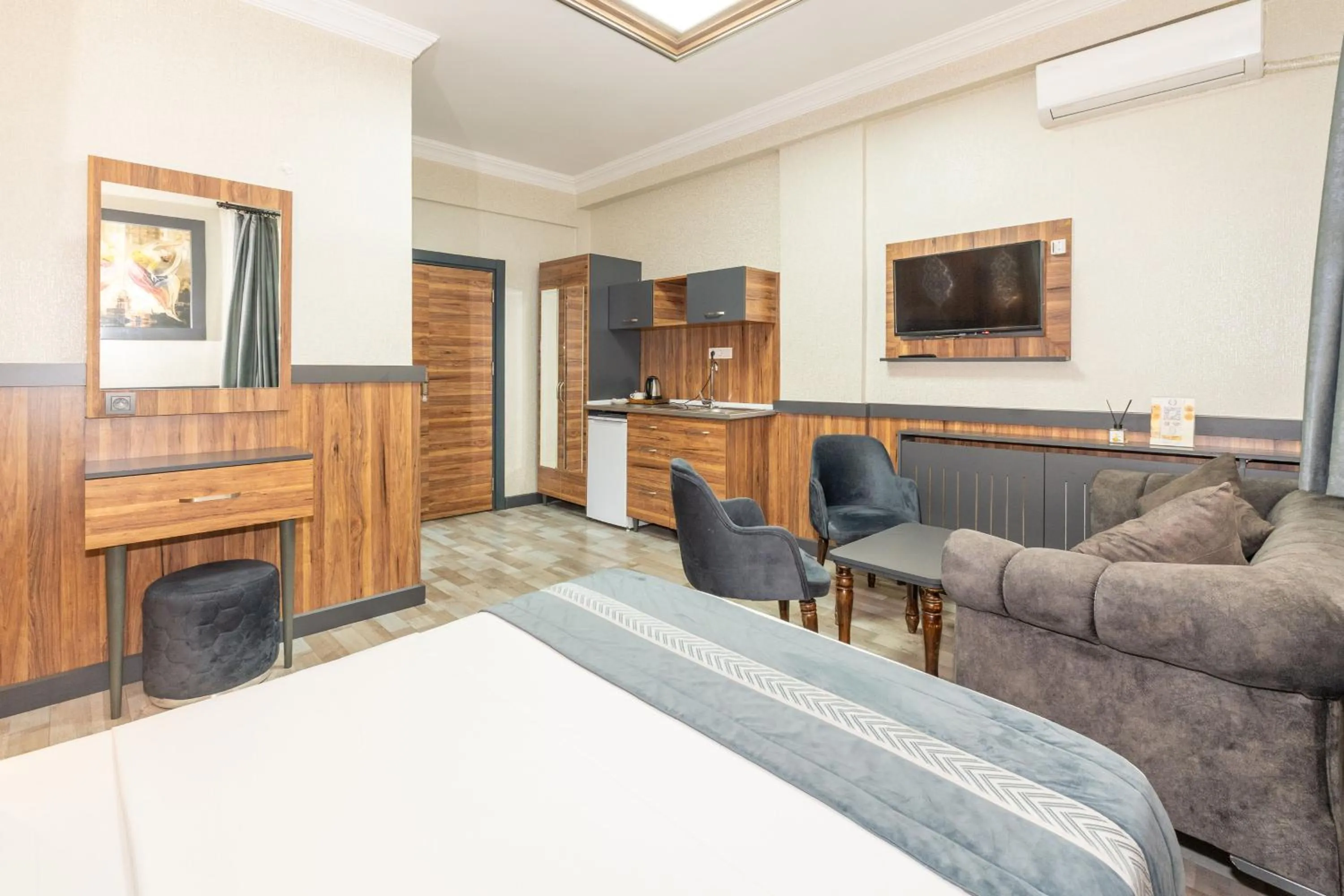 Bed in La Serena Taxim Hotel