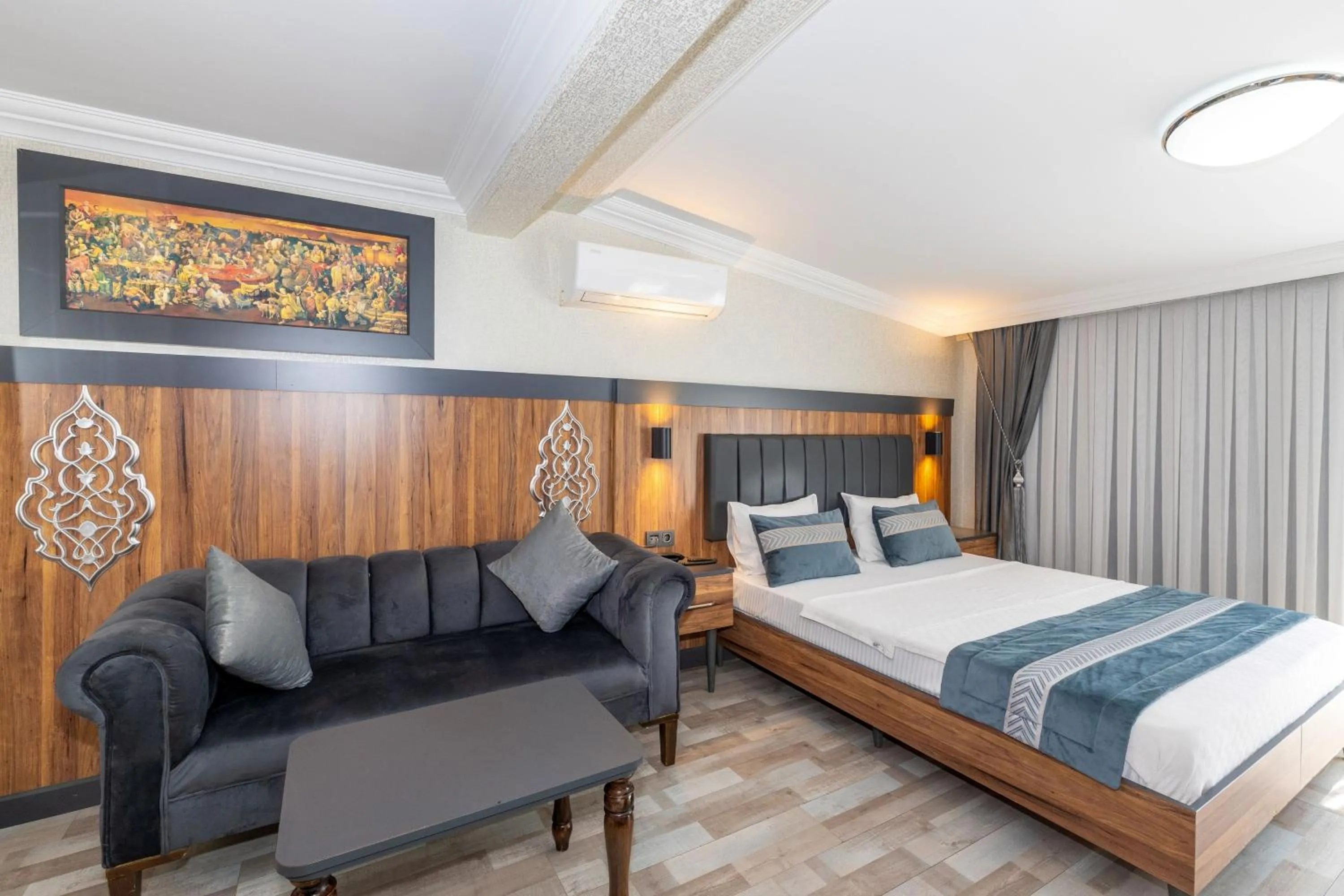 Bed in La Serena Taxim Hotel