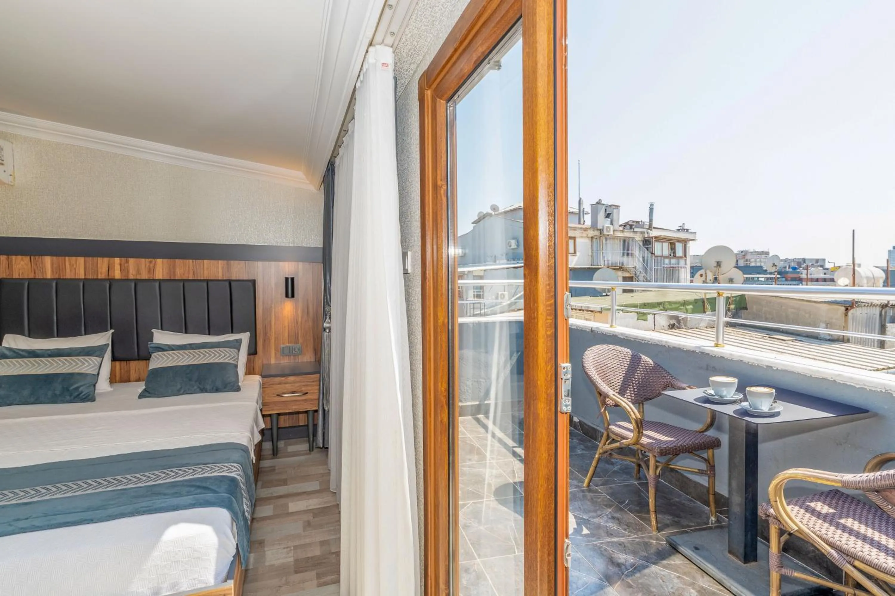 Bed in La Serena Taxim Hotel