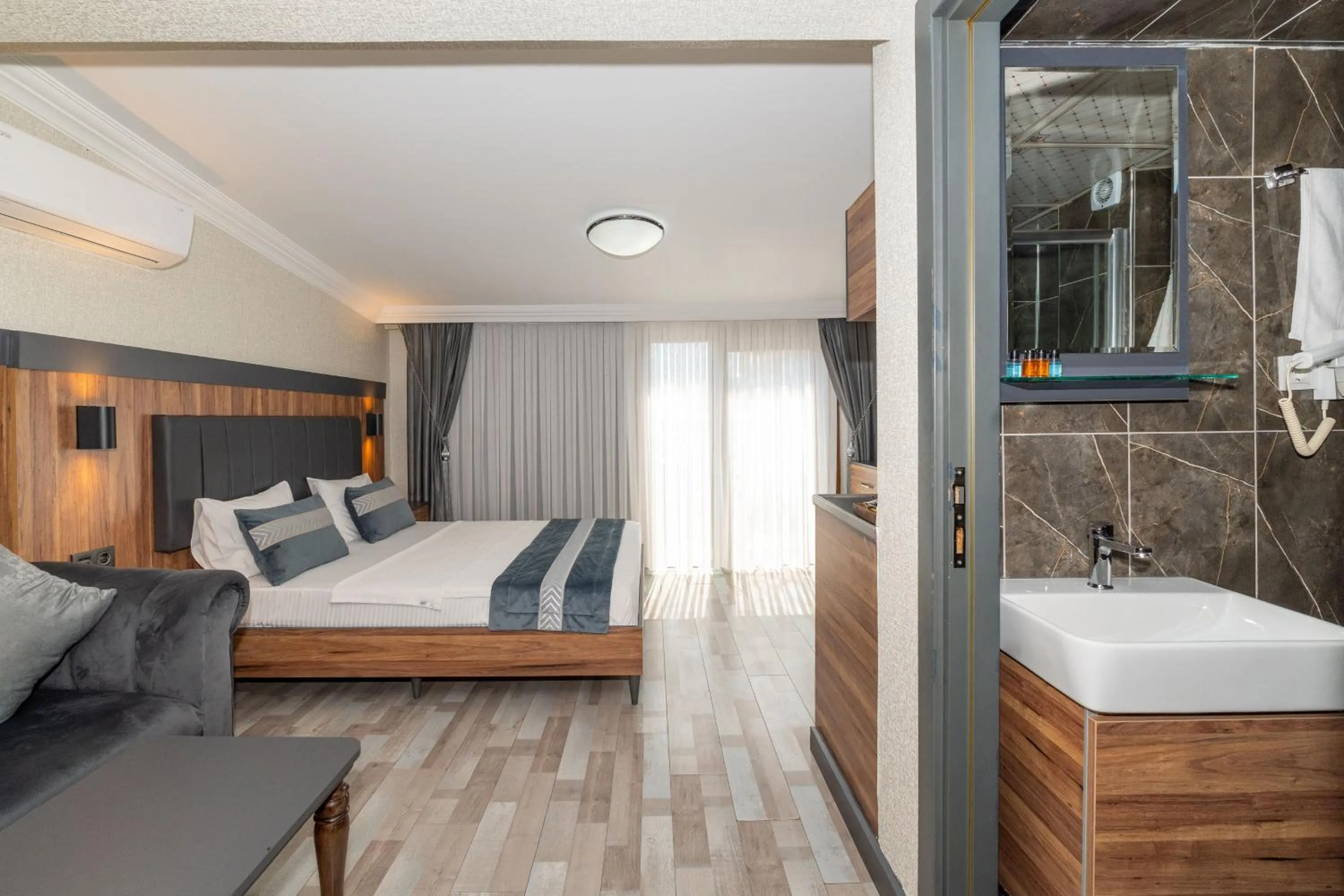 Bed in La Serena Taxim Hotel